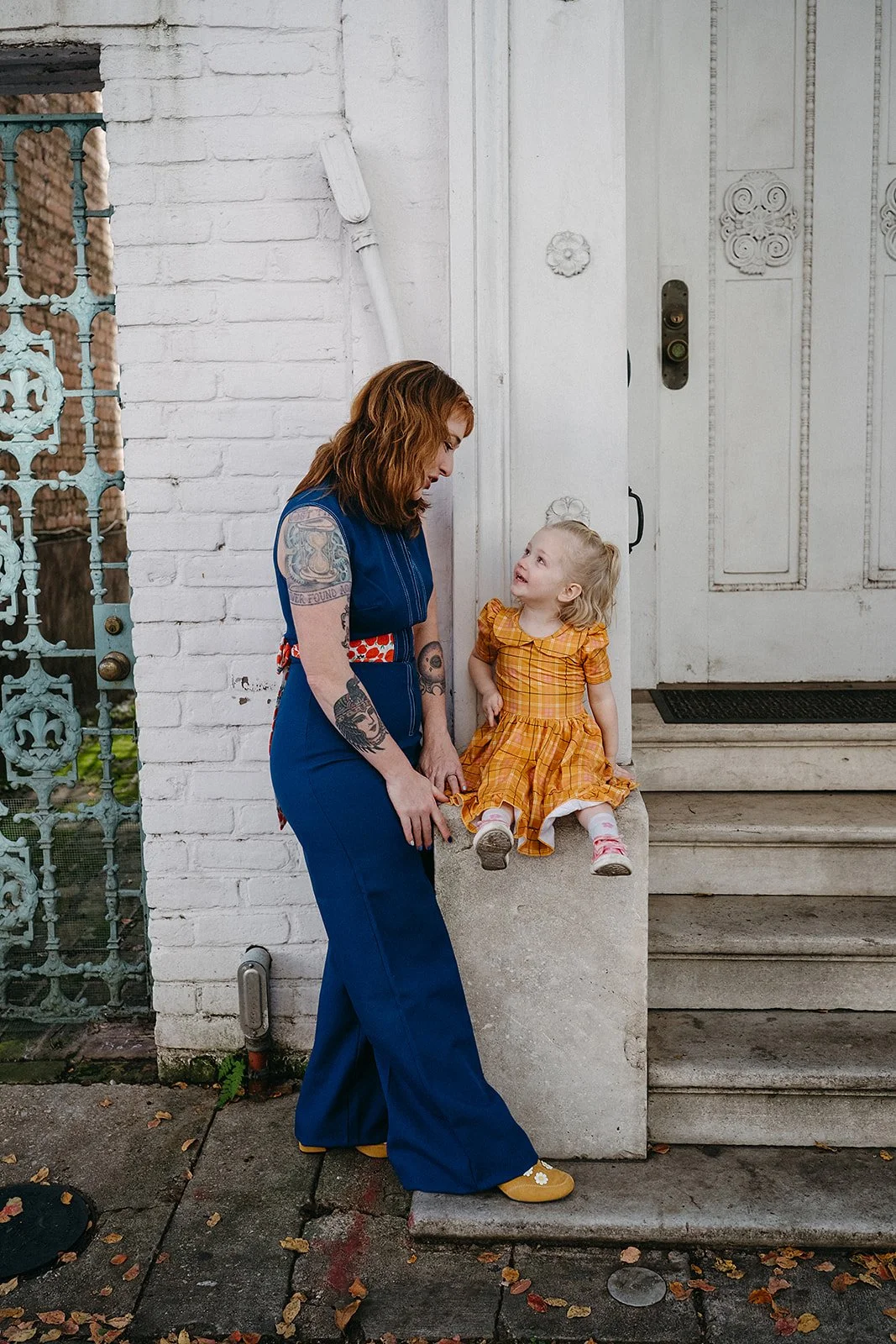 Mom and daughter during family photo session in the French Quarter, New Orleans. 