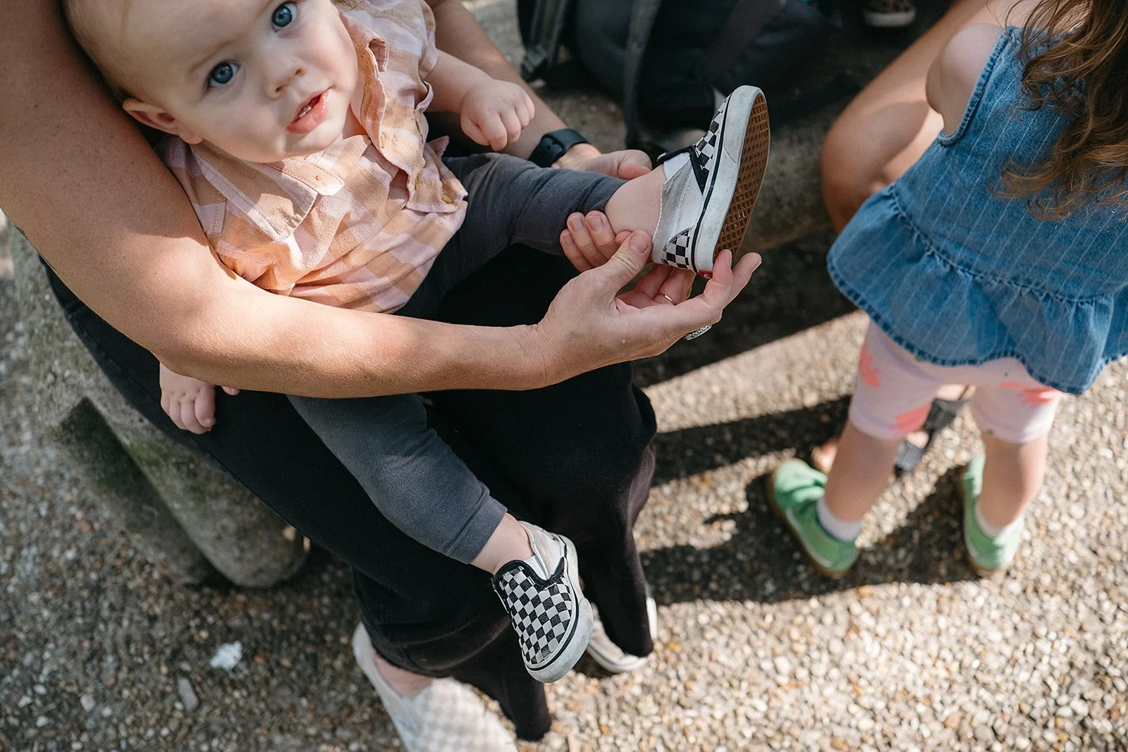 Getting our shoes on for a family photo session in City Park, New Orleans
