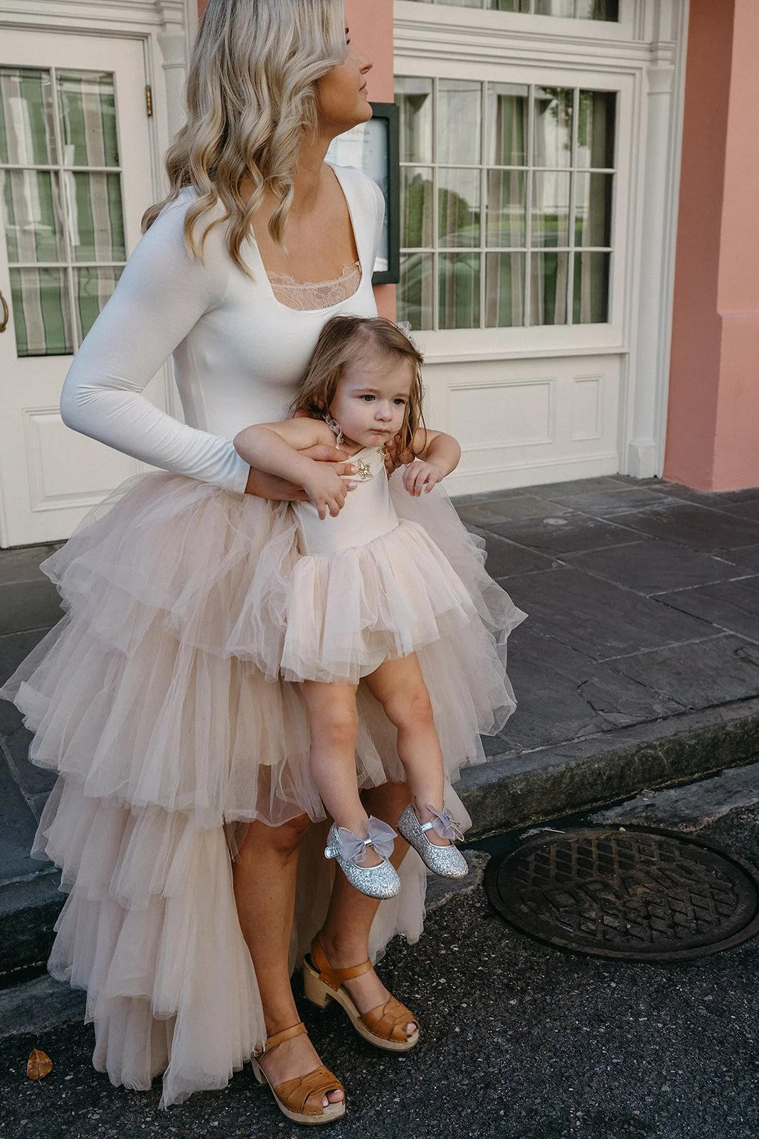 Catching the run away kiddo during family session in the French quarter, New orleans on Royal Street