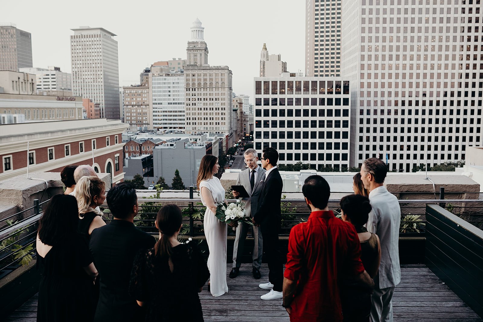 Rooftop Wedding ceremony at The Barnett - JDV by Hyatt in New Orleans.  Intimate wedding with bride, groom and family.