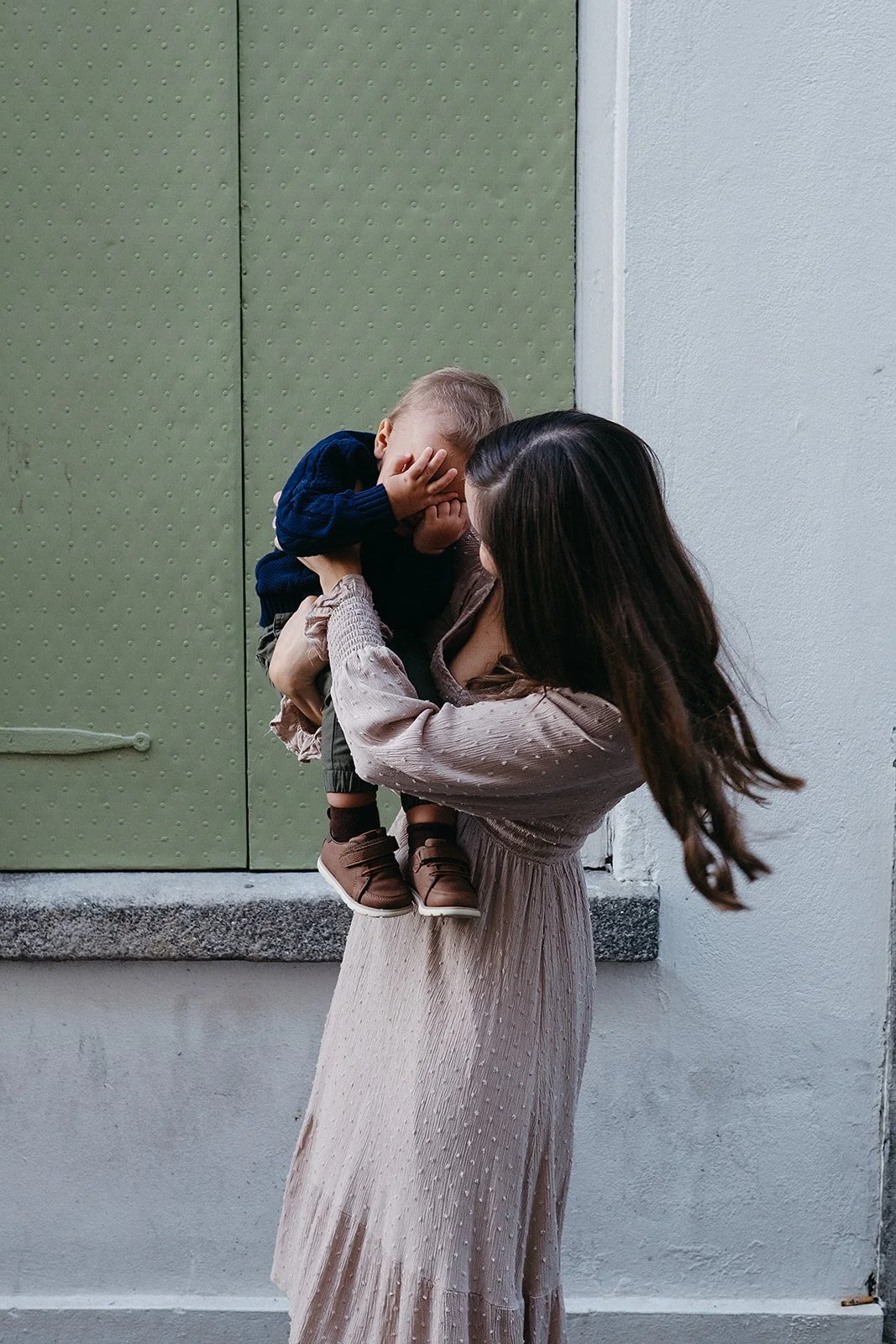 Mom and son during a family photo session in the French Quarter, New Orleans