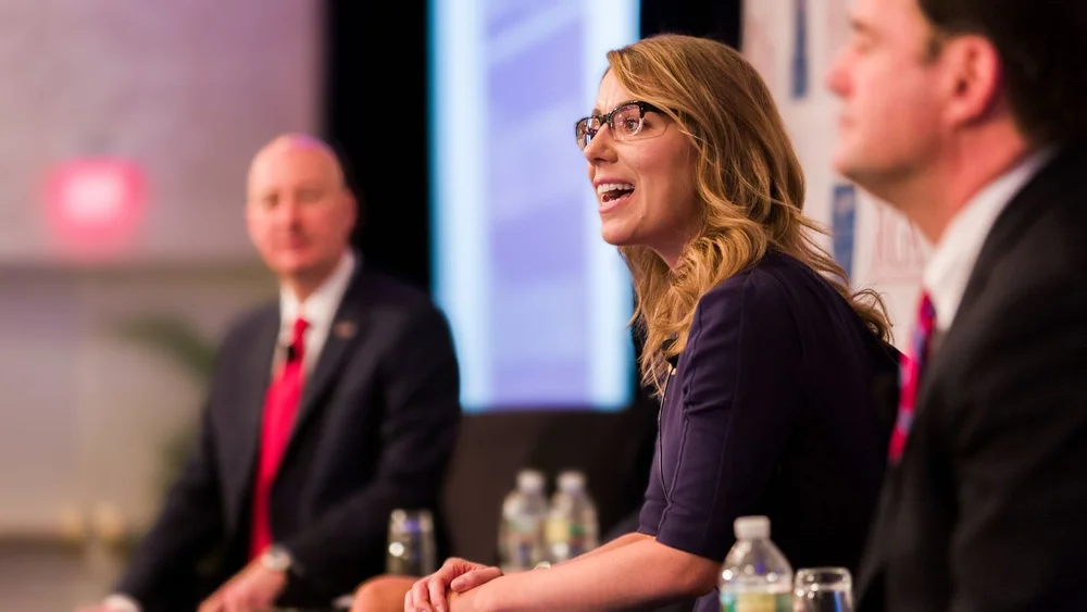 Mattie speaking on a panel