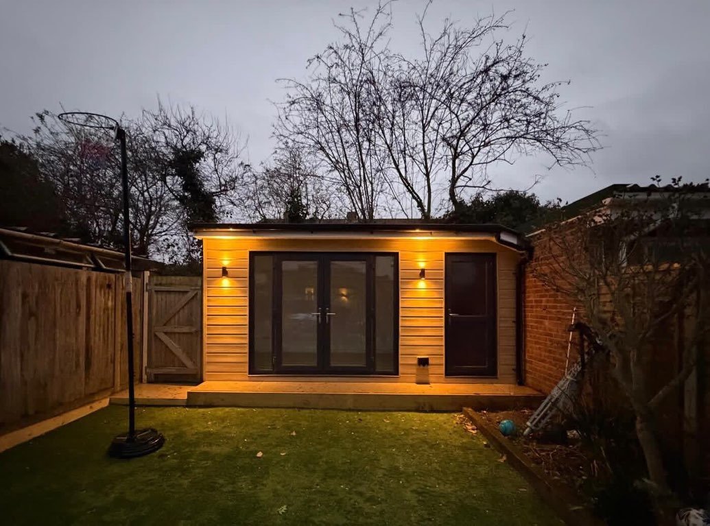 A tired old garage out, a spacious new family garden room in 👏🏼

Custom-built to maximise the space, finished with sleek wood-effect cladding, and complete with extra storage for all those garden essentials.
We also installed fresh artificial grass