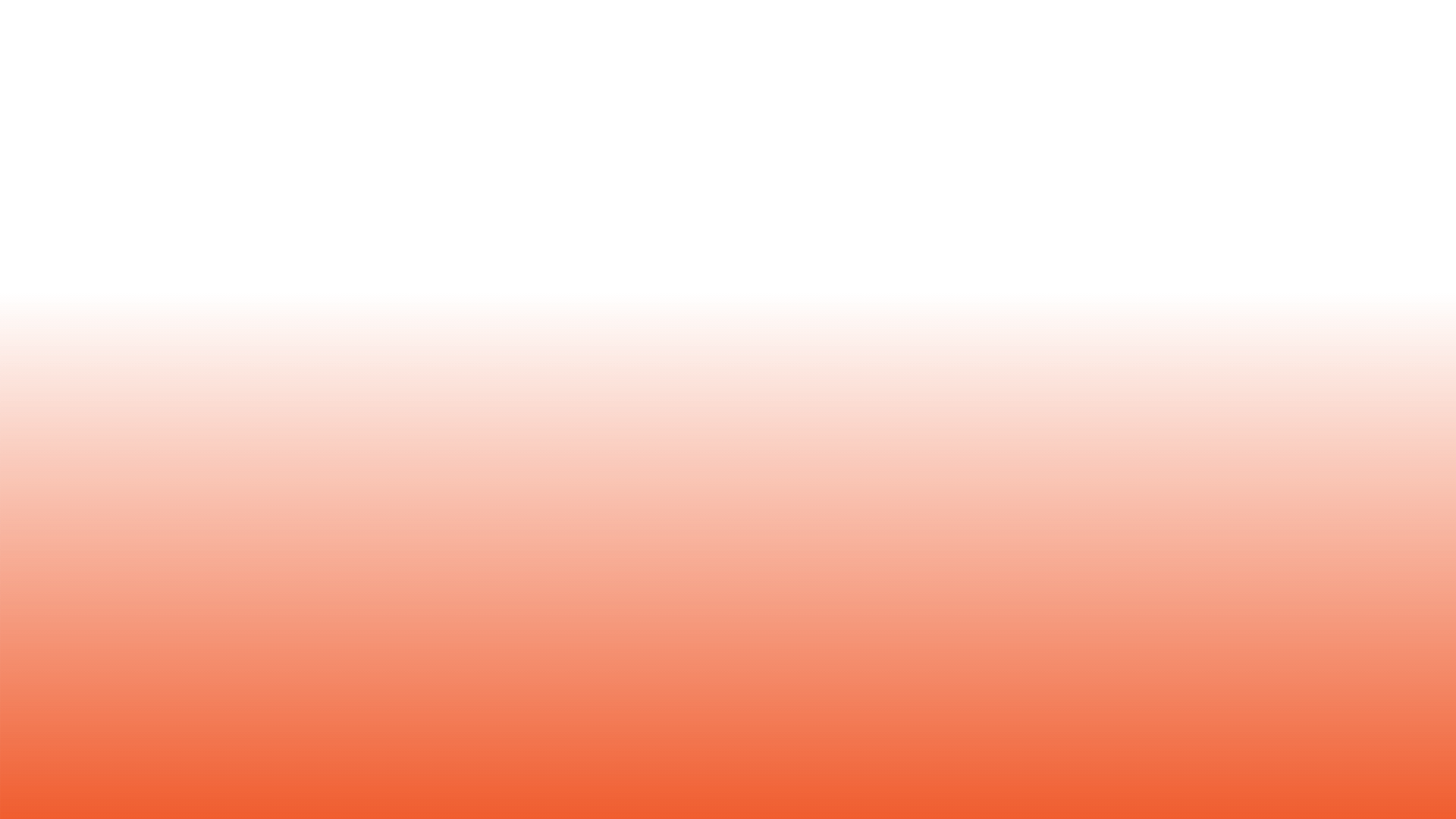 Close-up of an orange and black baseball glove holding an orange baseball with black stitching on a green grass field.