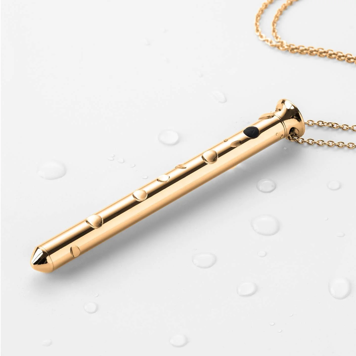 A 24K gold vibrator discreetly styled as a necklace? Now you can have boujee orgasms anywhere you want!