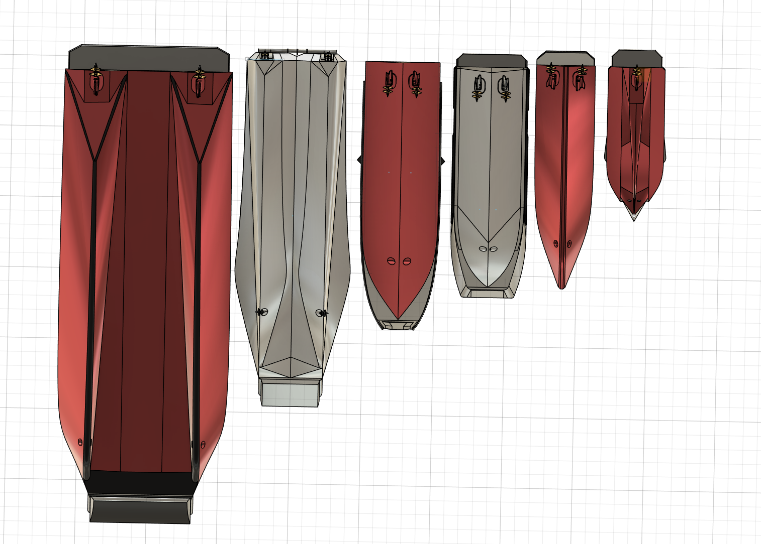 Top-down view of six boats in various sizes and colors parked in a grid layout.