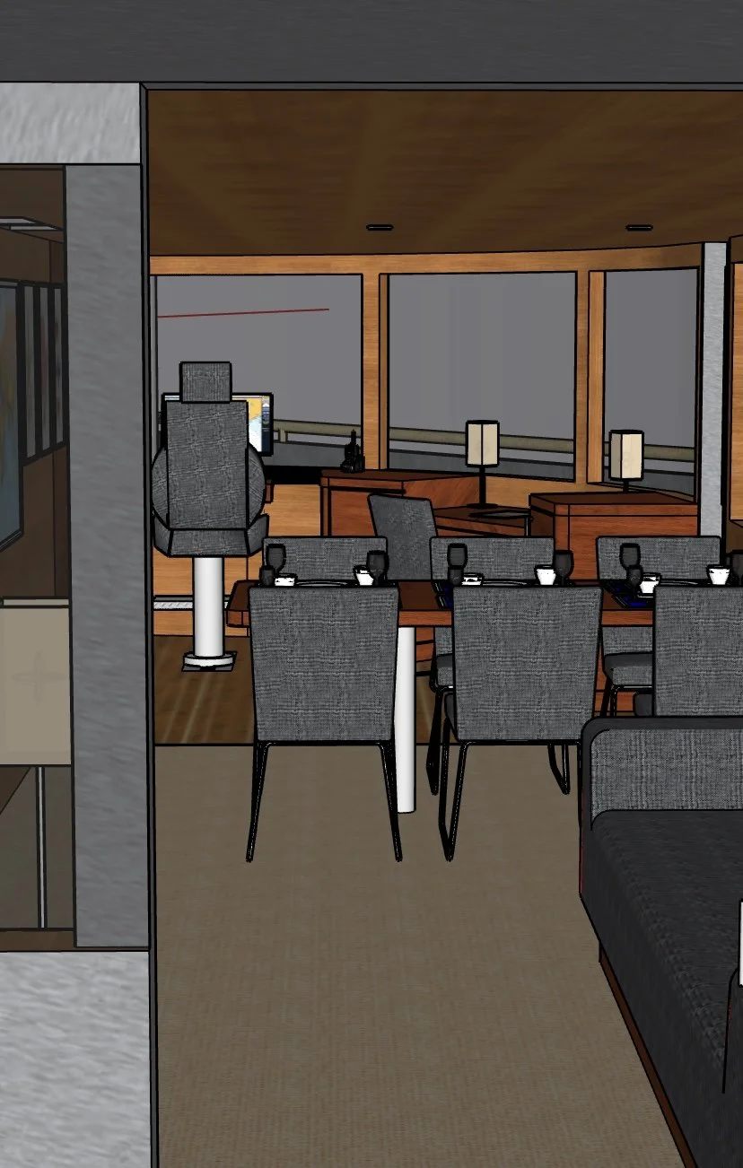 Interior of a modern conference room with a long wooden table, gray upholstered chairs, and a desk with a computer and desk lamps, overlooking a city skyline through large windows.