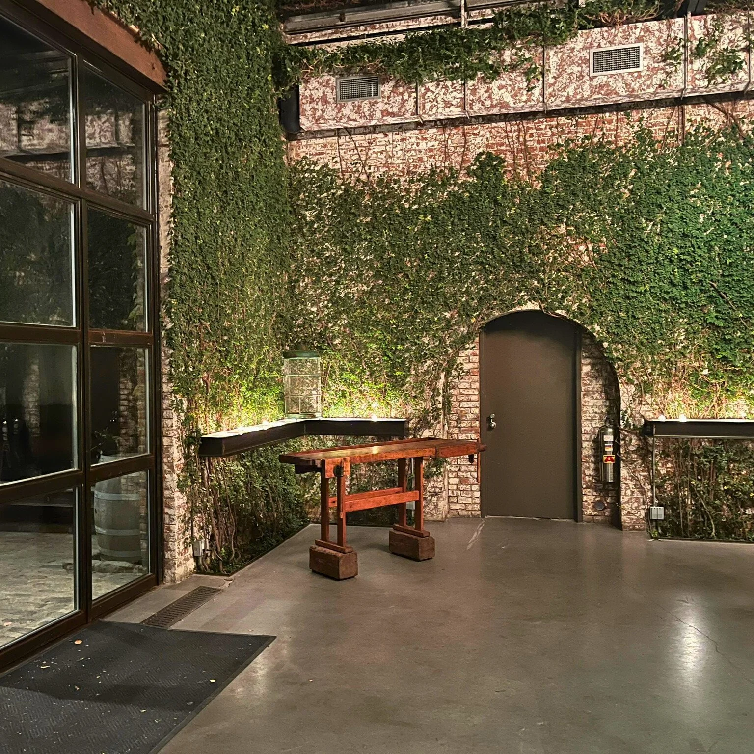 Antique pine workbench styled in an industrial interior