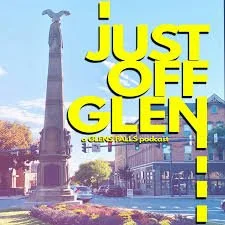 A graphic promoting the 'Just Off Glen' podcast with the text in large yellow letters over a background of a cityscape and statue.