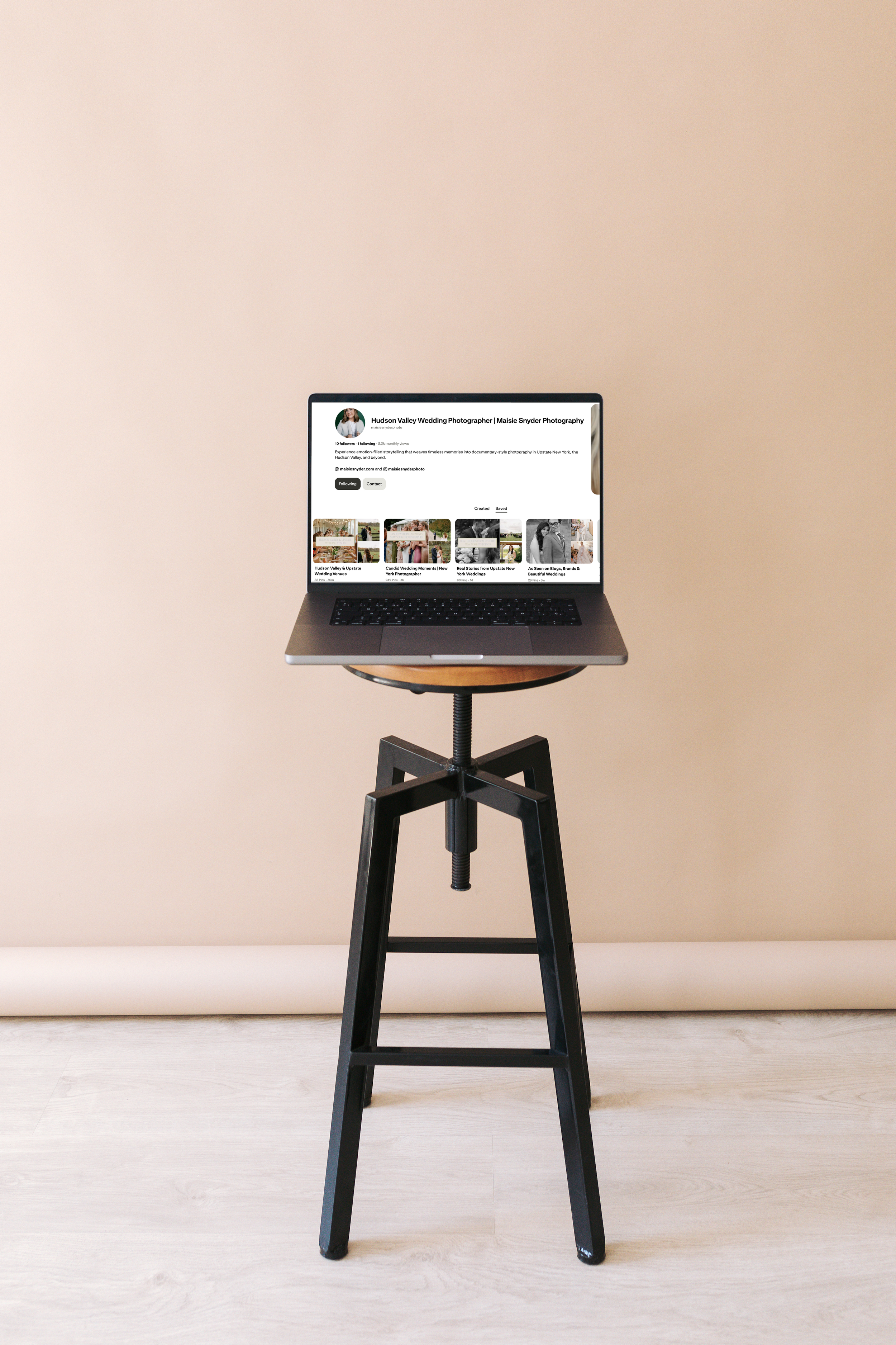 Laptop displays a Maisie Snyder Photography destination wedding photographer profile for Pinterest Marketing.