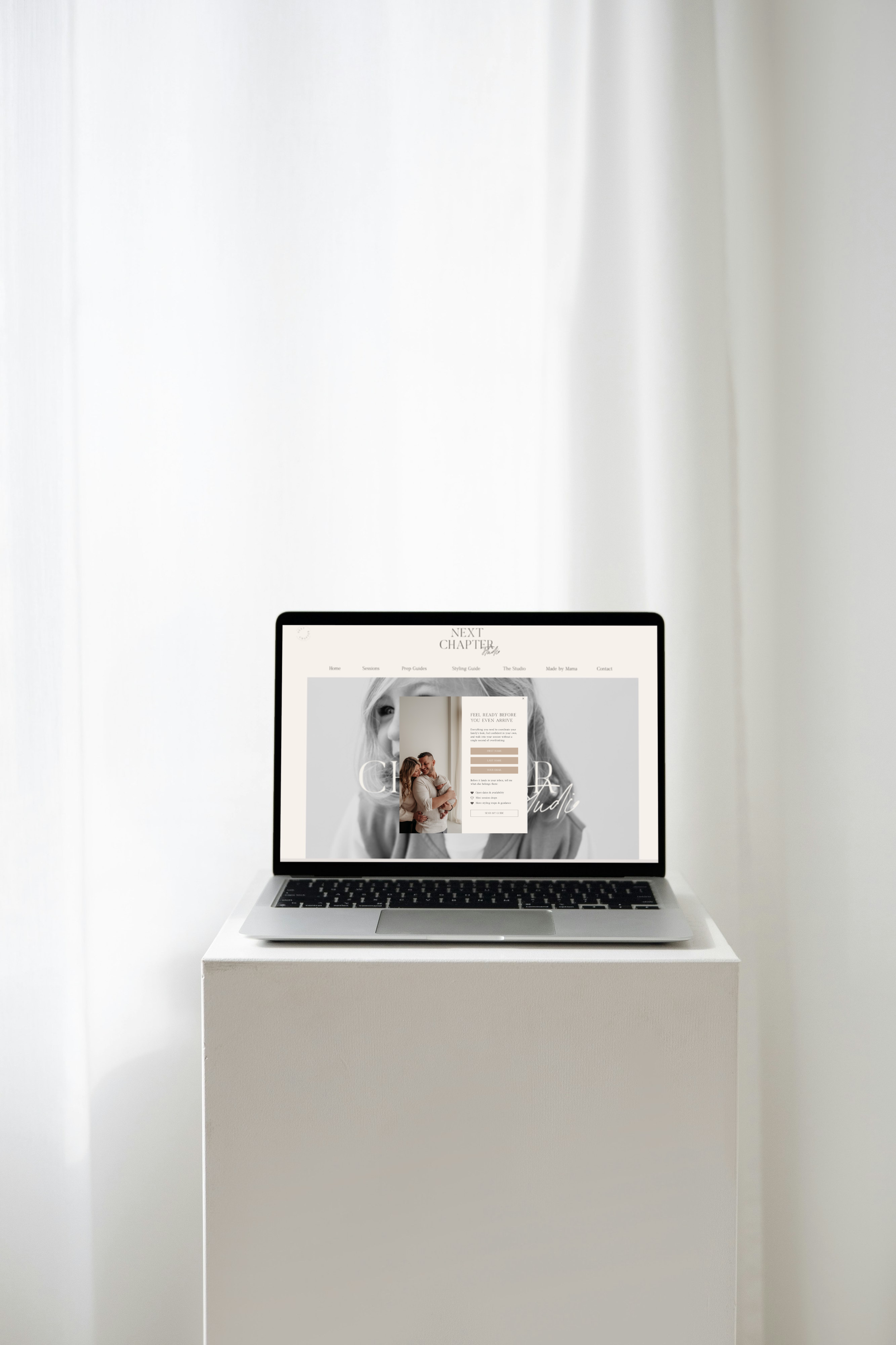 The Next Chapter Studio website homepage displayed on a laptop, showcasing Tyler's Glens Falls motherhood photography.
