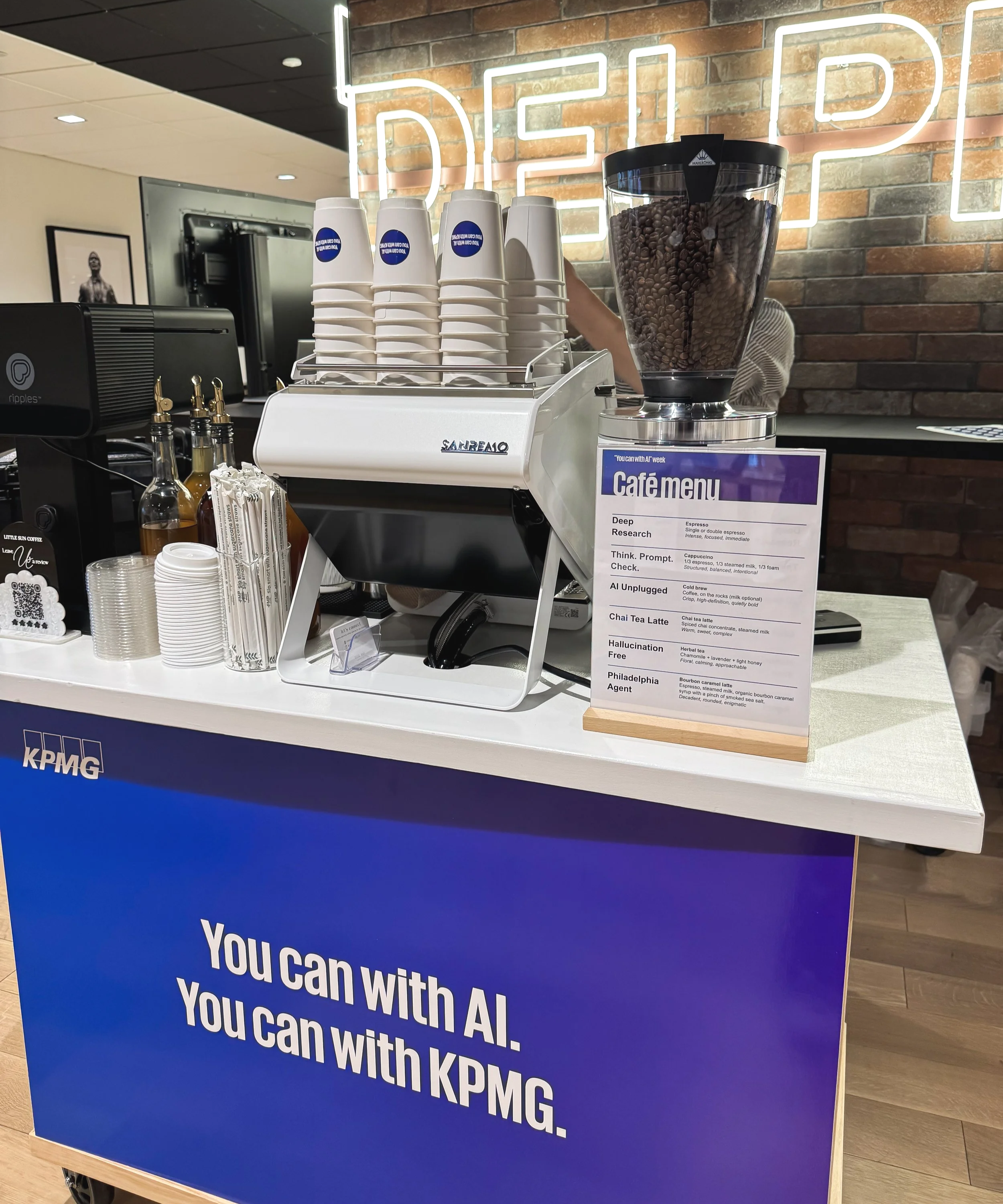 Corporate coffee cart catering in the philadelphia region serving specialty coffee drinks from a traveling professional barista.