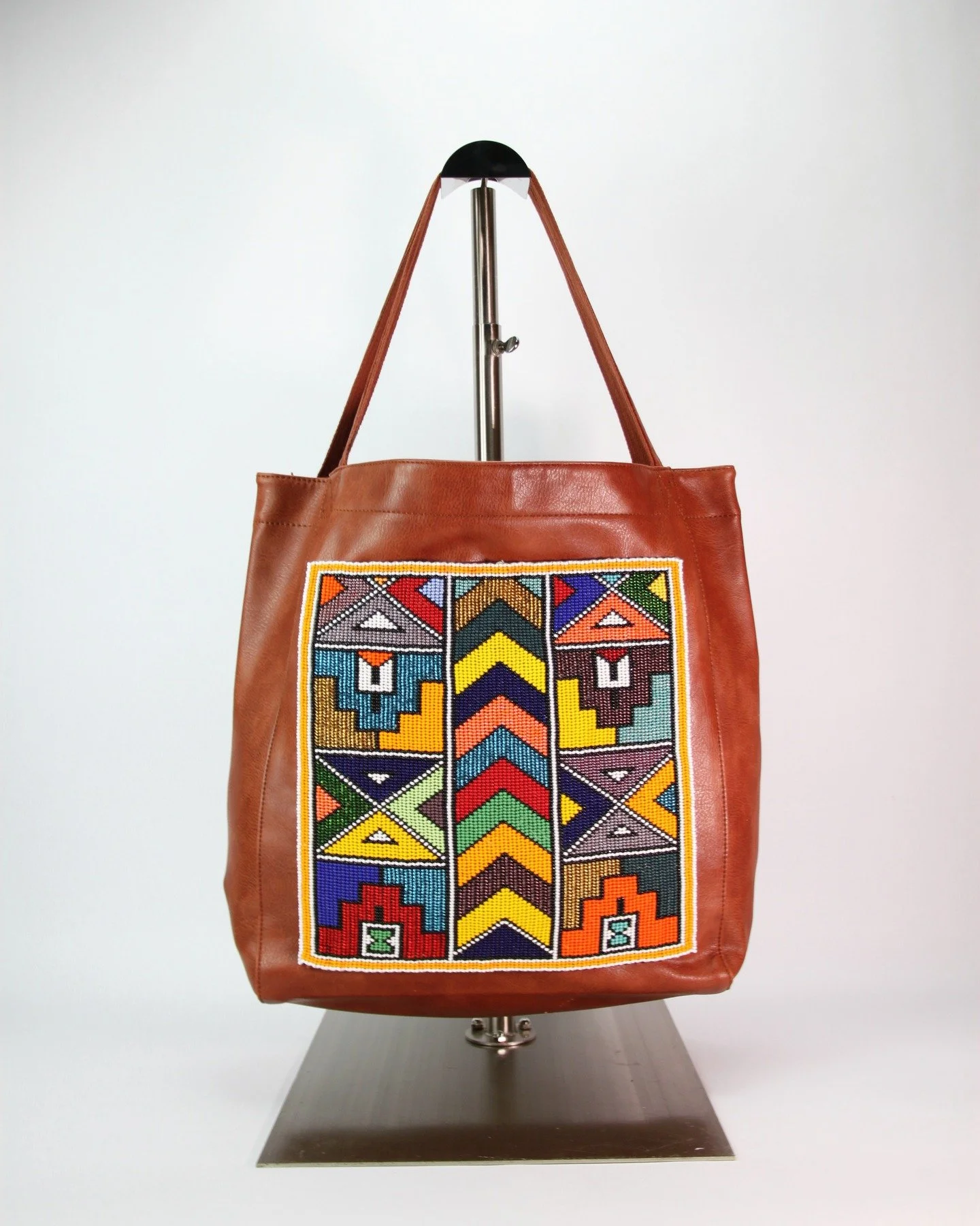 Take a look at our new bags! Handbeaded leather totes for your retail location available only on our site, check us our from our link in the bio!