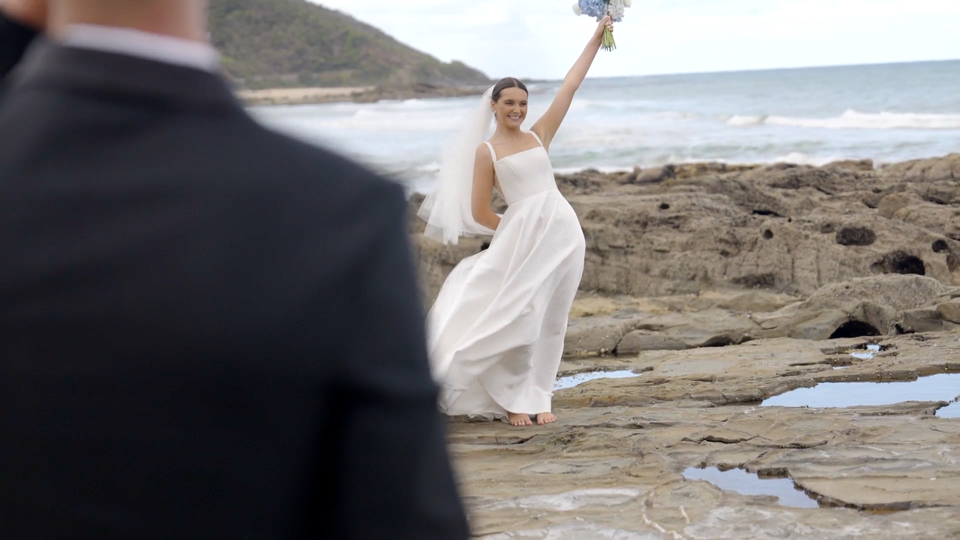 wedding-video-short-film-flowers-rocks-beach-wye-river.png