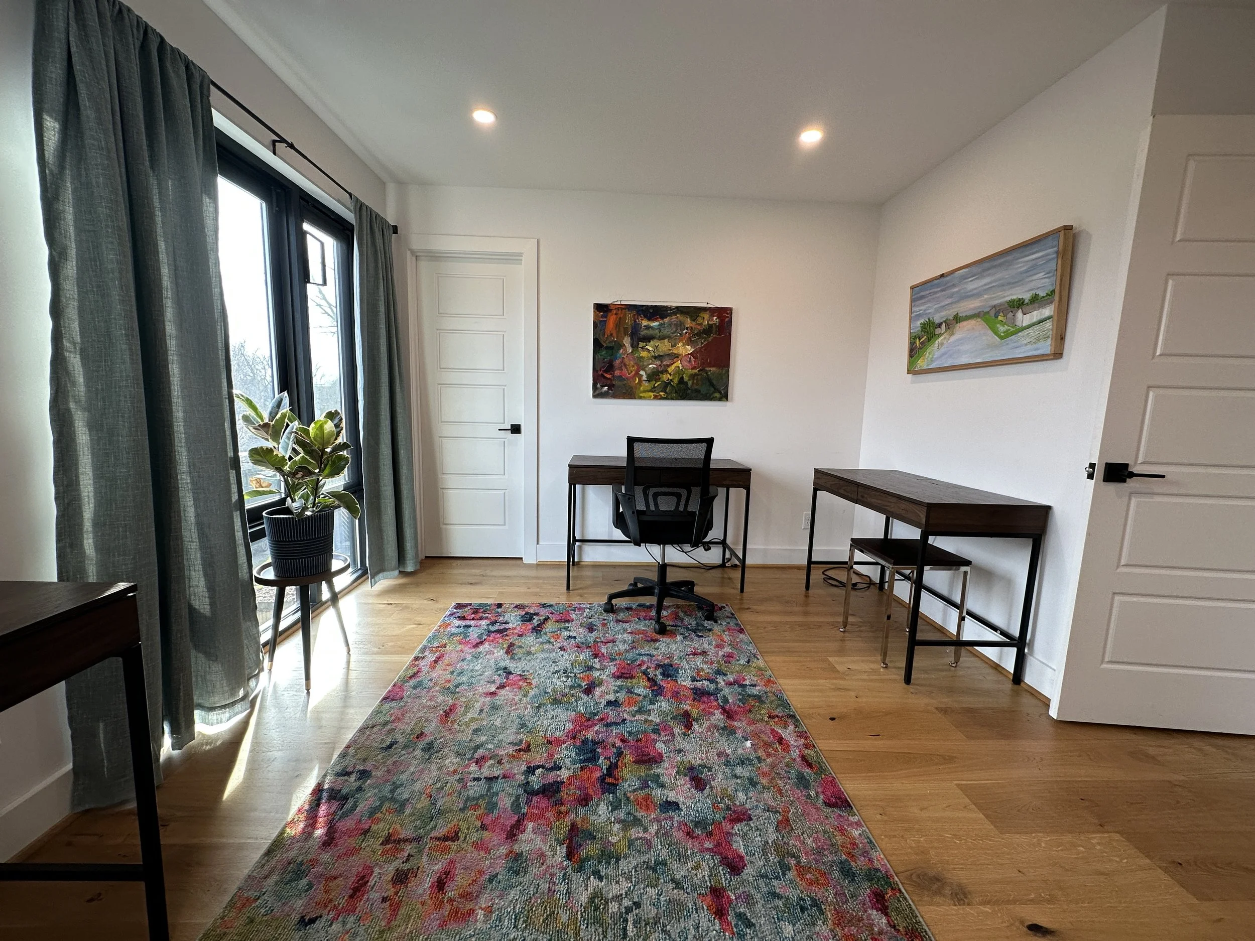 Office 1 (East) door on back wall leads to a large closet