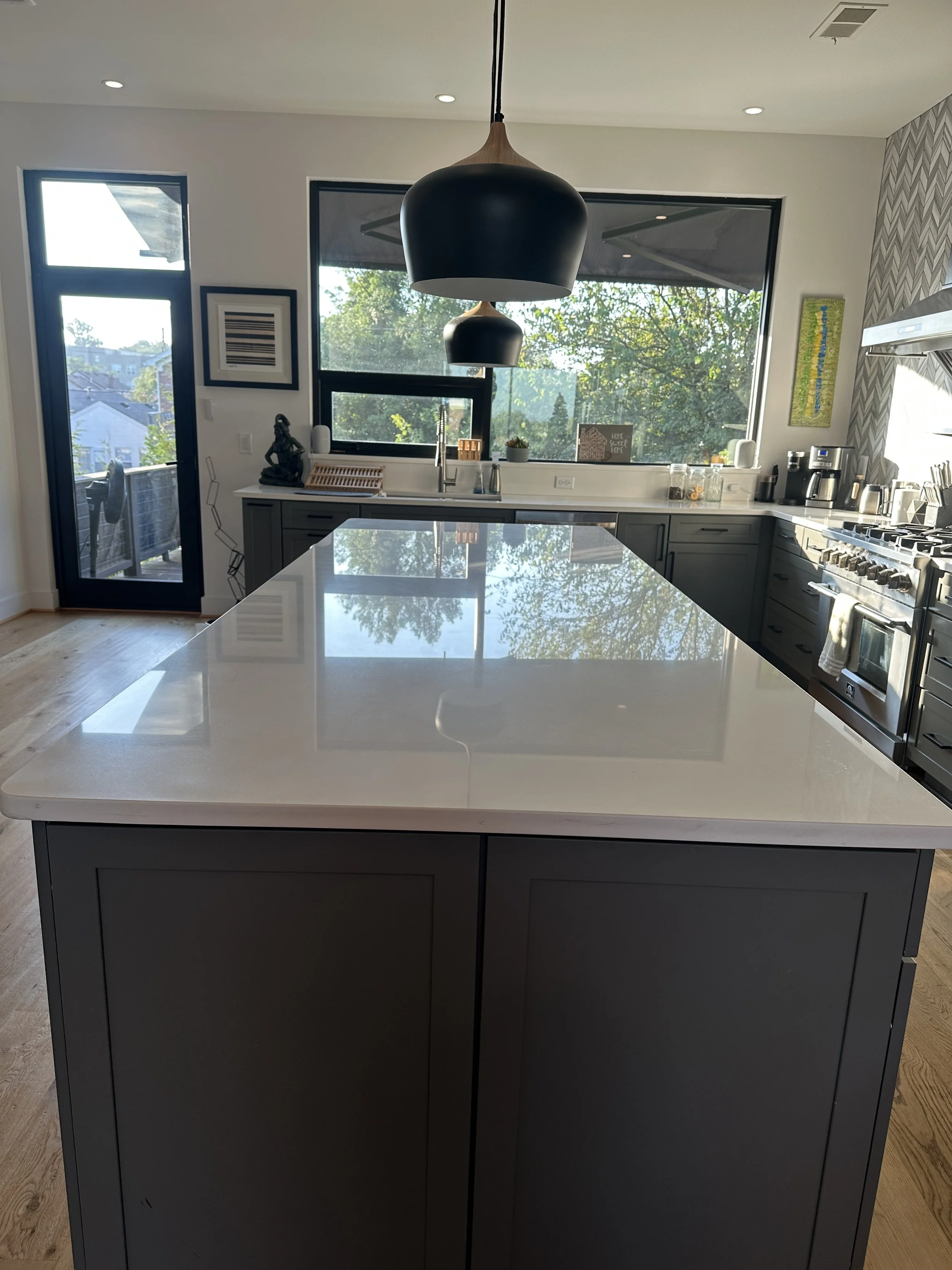 kitchen counter/island (has seating for four)