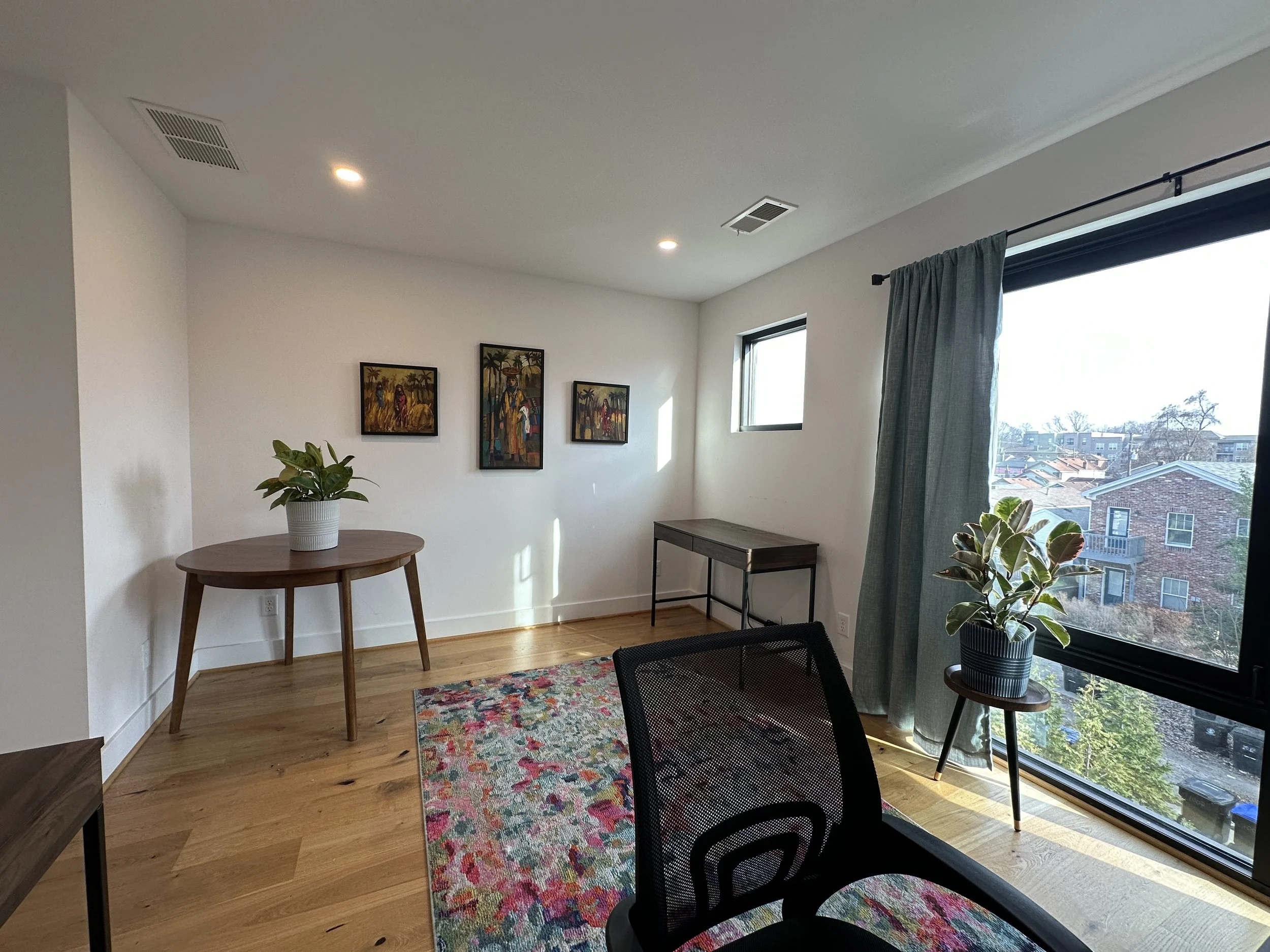 Office 1 (East) table in corner comfortably seats 3