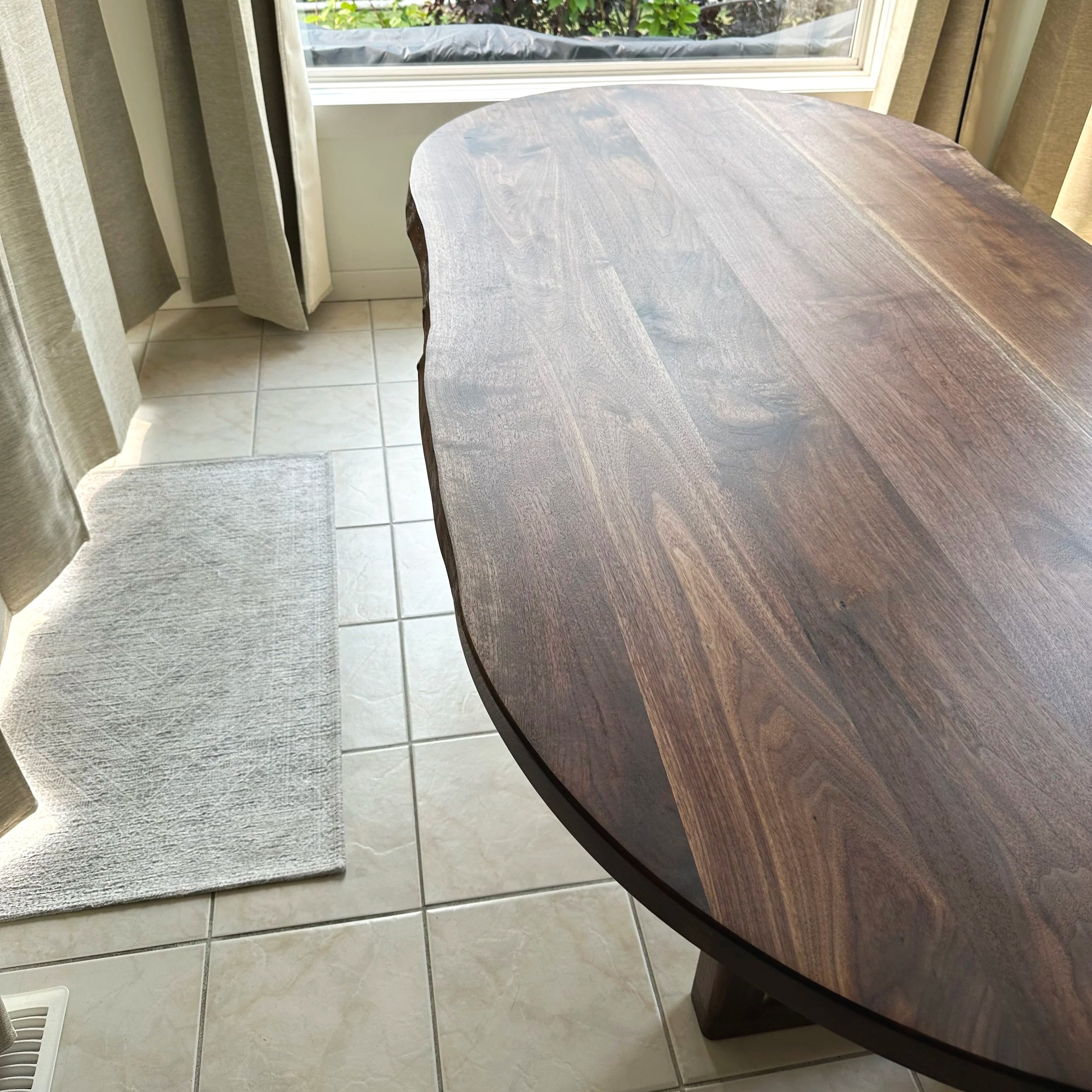 Extended view of the live edge used on this dining table
