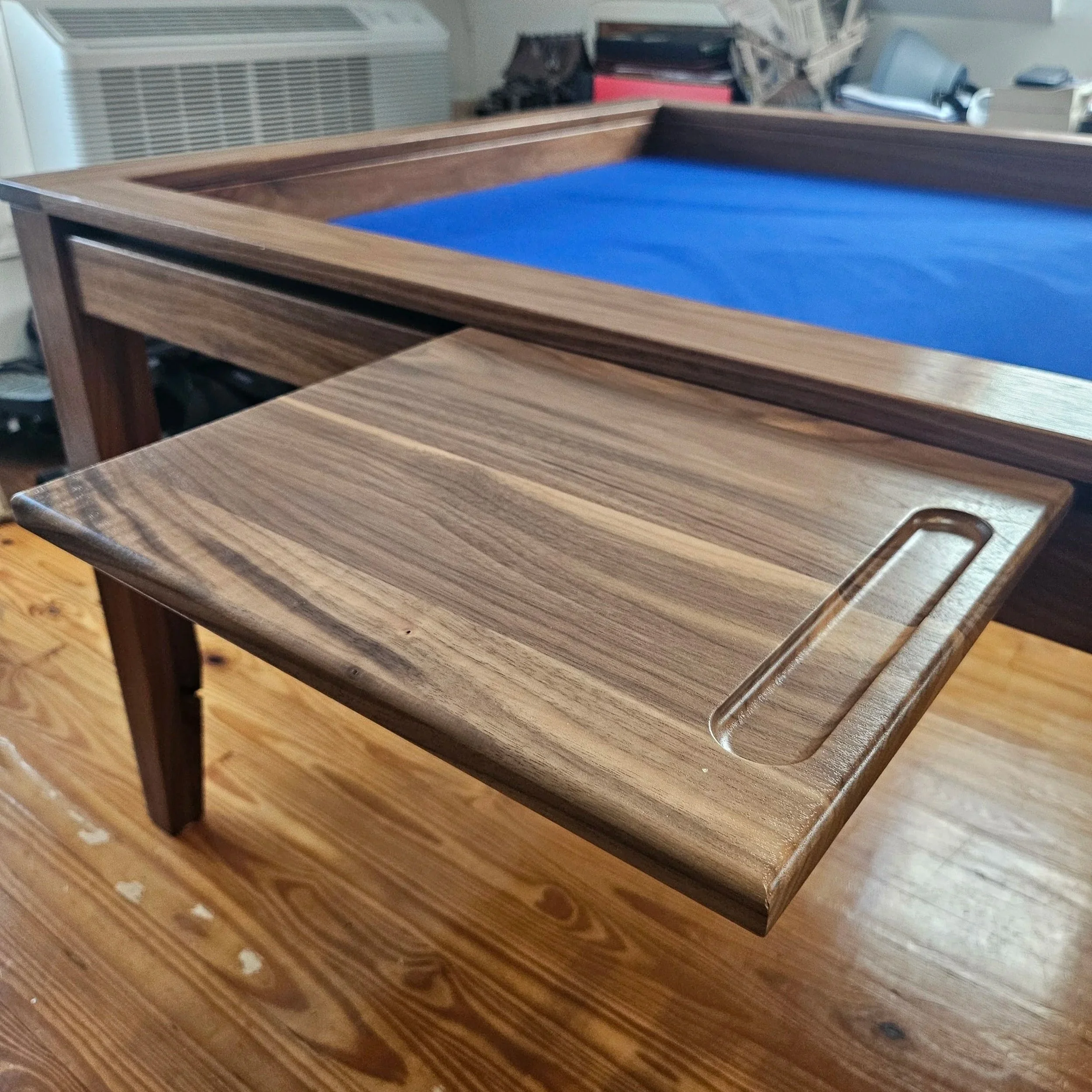 Player desk accessory attached to the magnetic game rail