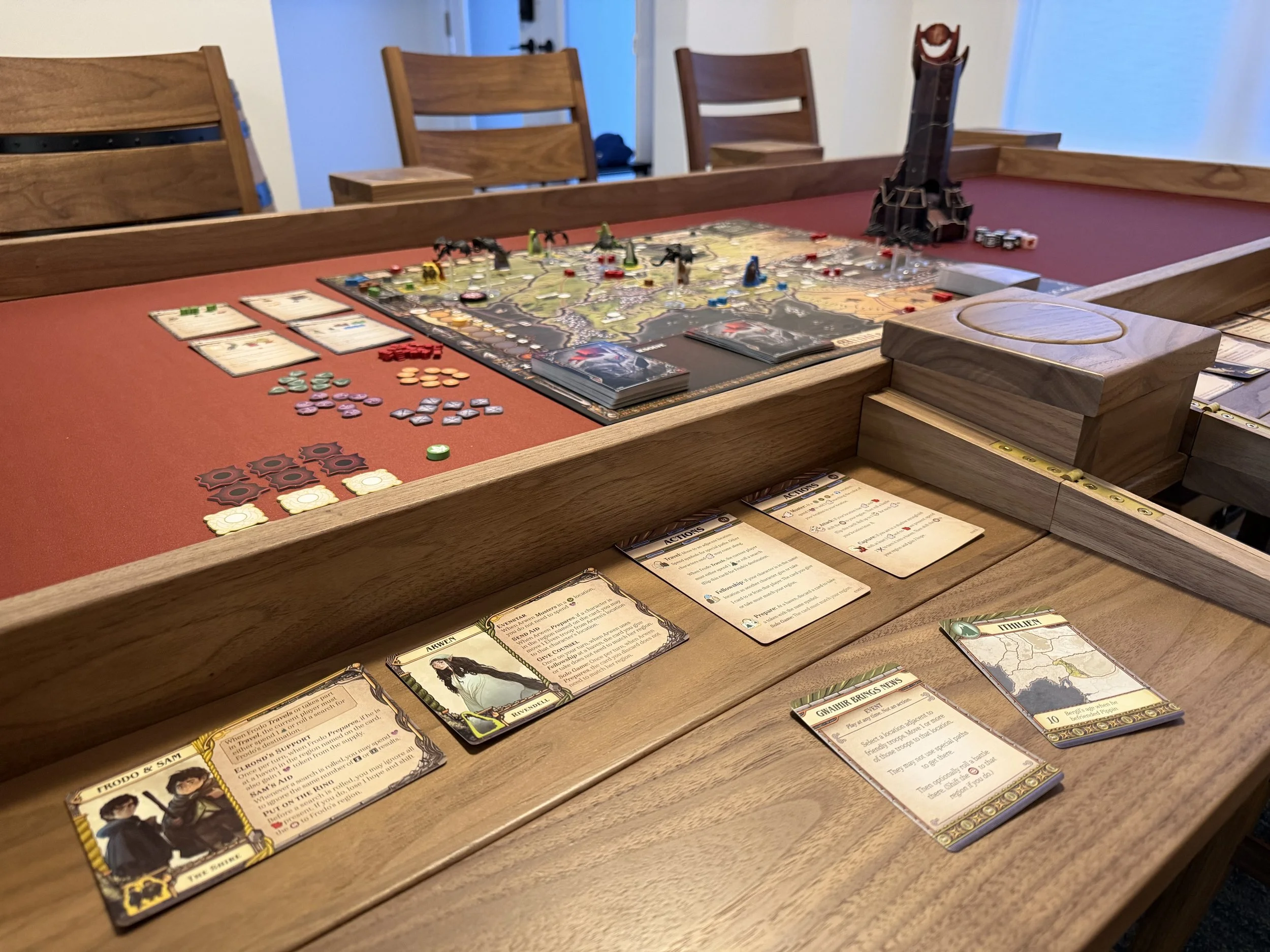 close up of a player station folded out and a game setup on it