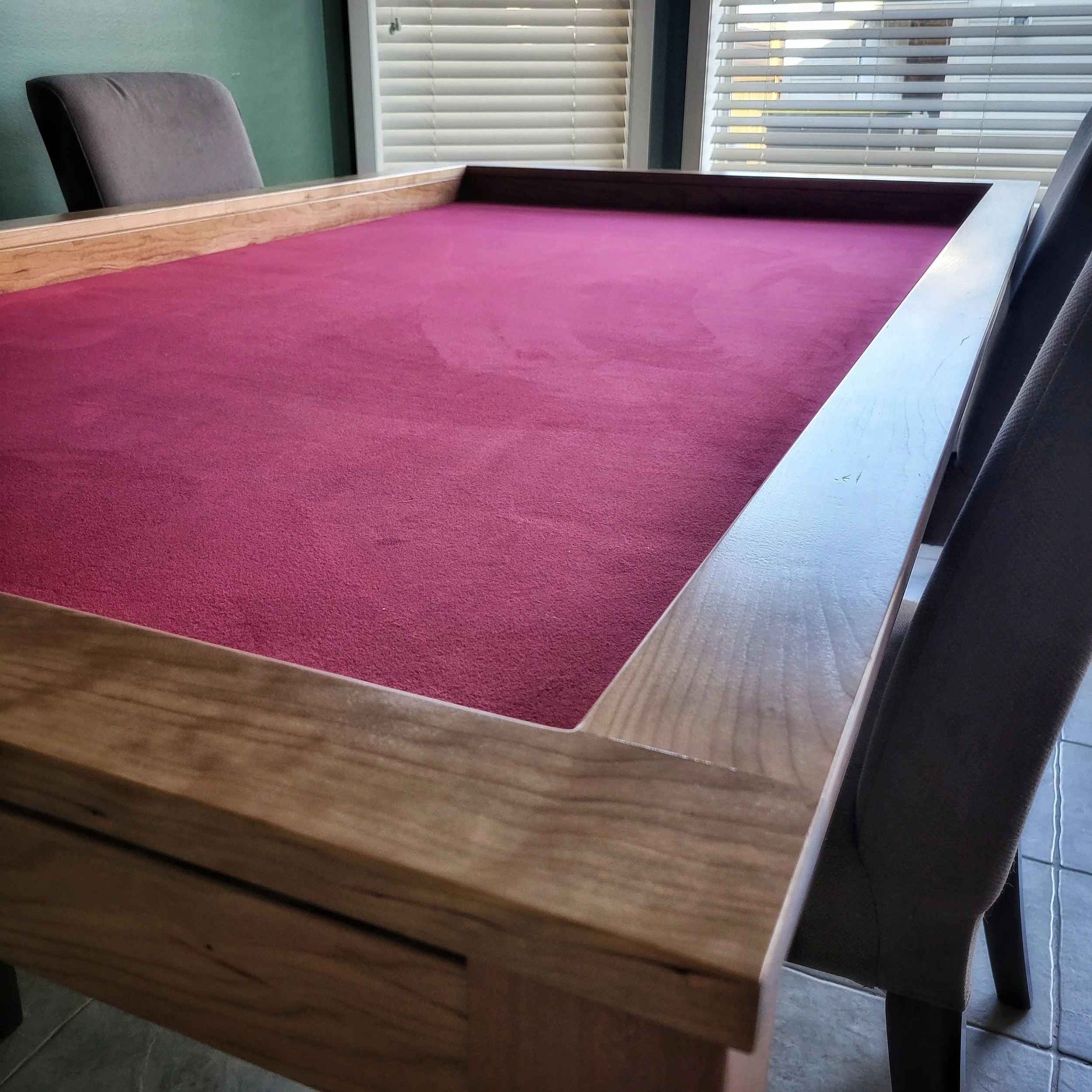 Close up of the corner detail on this cherry game table