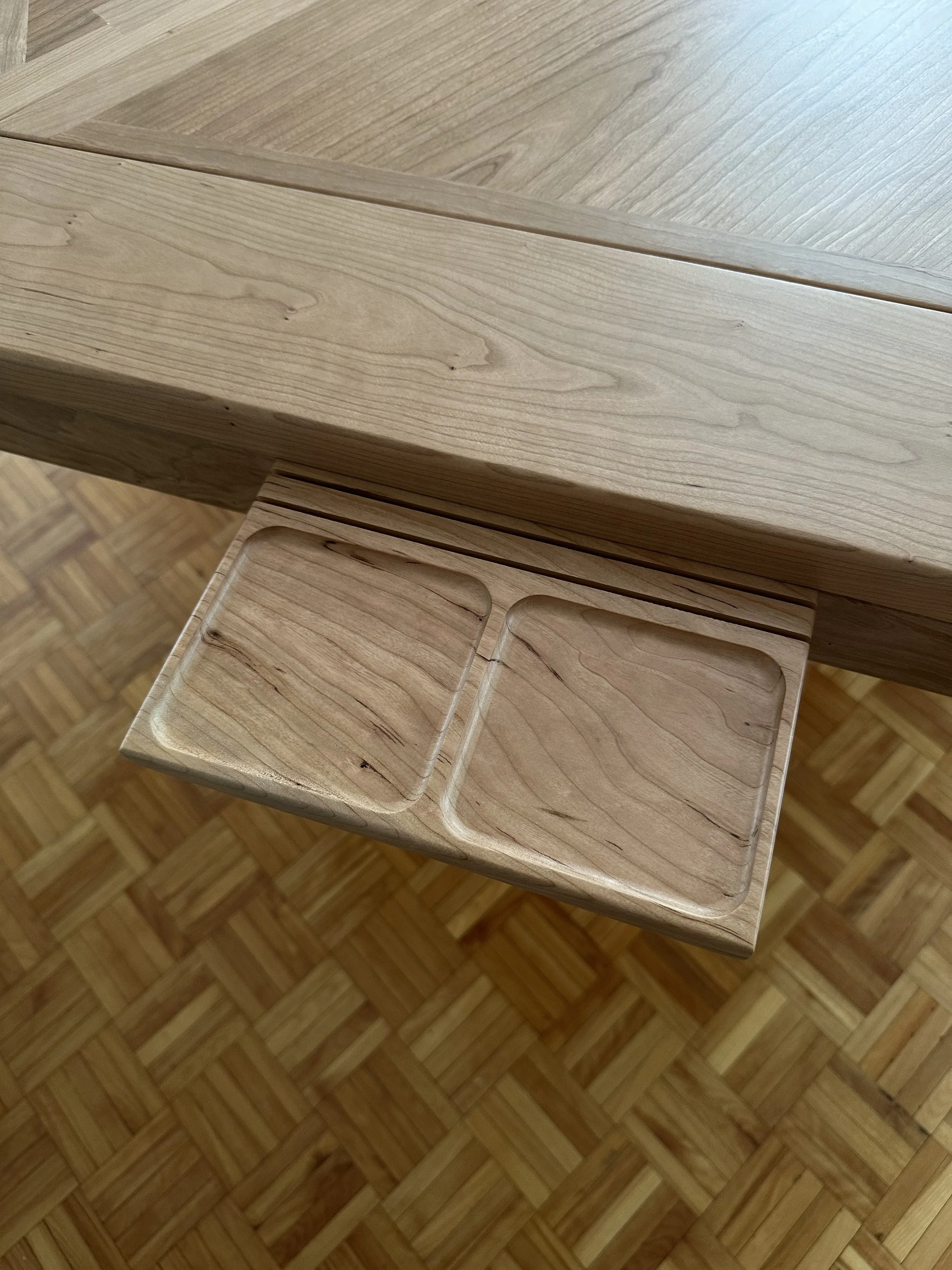 Close up view of a cherry component tray clipped into the magnetic game rail