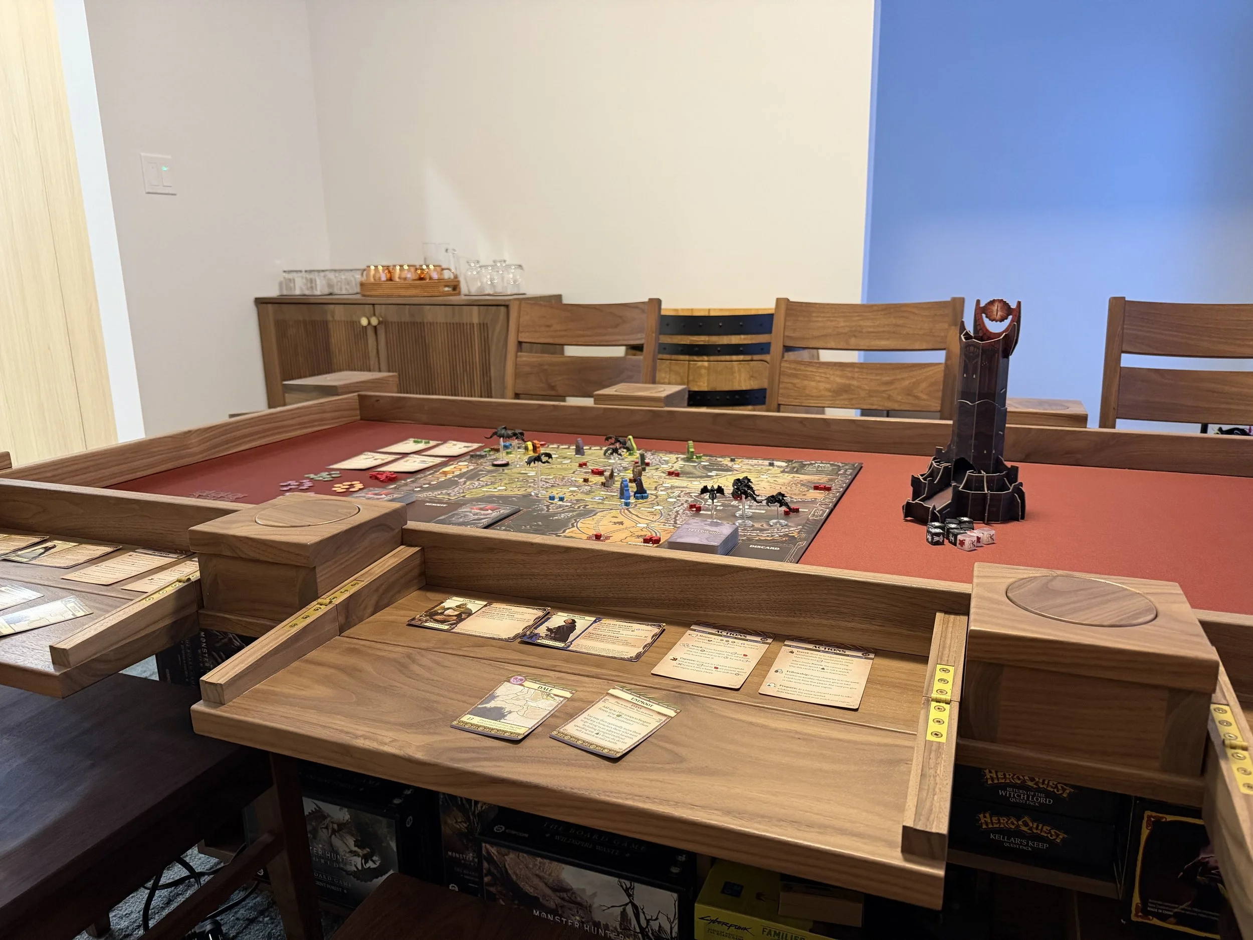 Side view of a player station game table and a game setup on it