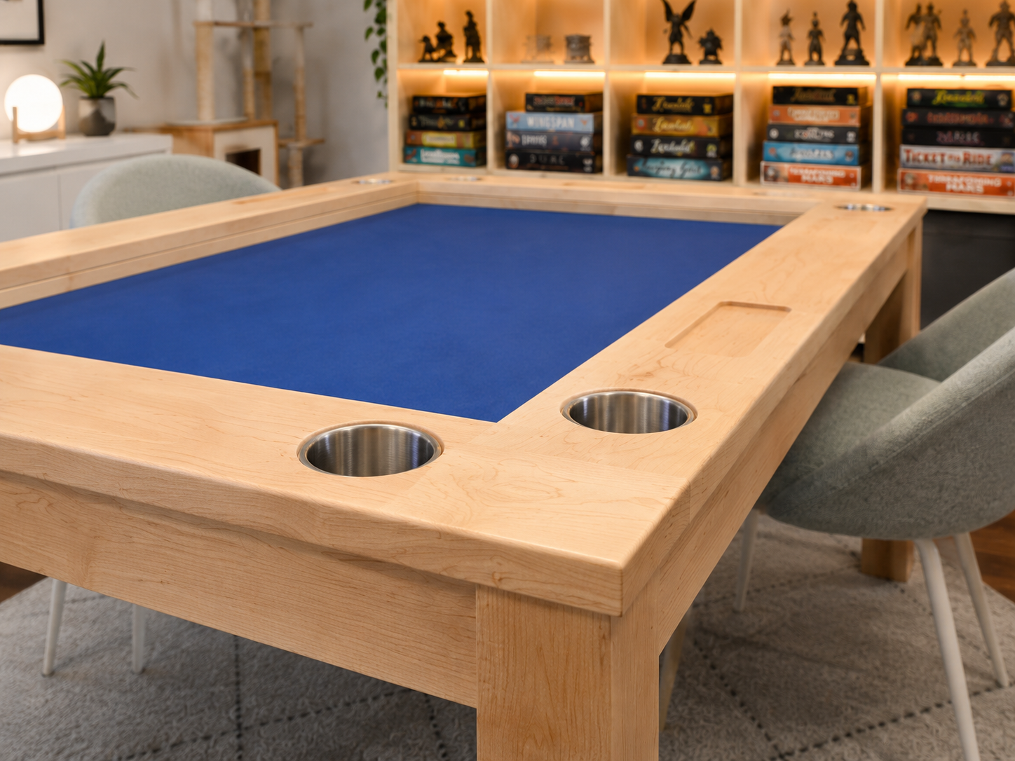 Detailed view of the corner of the table showcasing the cup holders and the component trays in the armrest