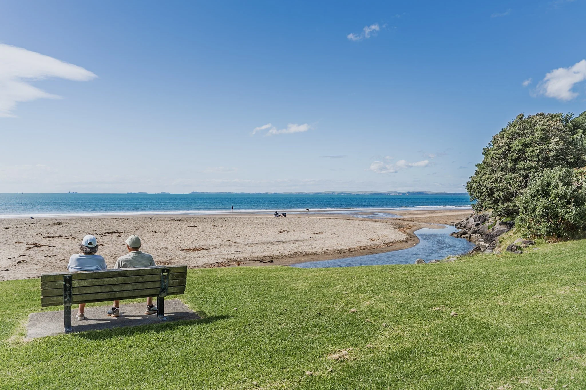 A view of Mairangi Bay beach, overlooking the stream mouth