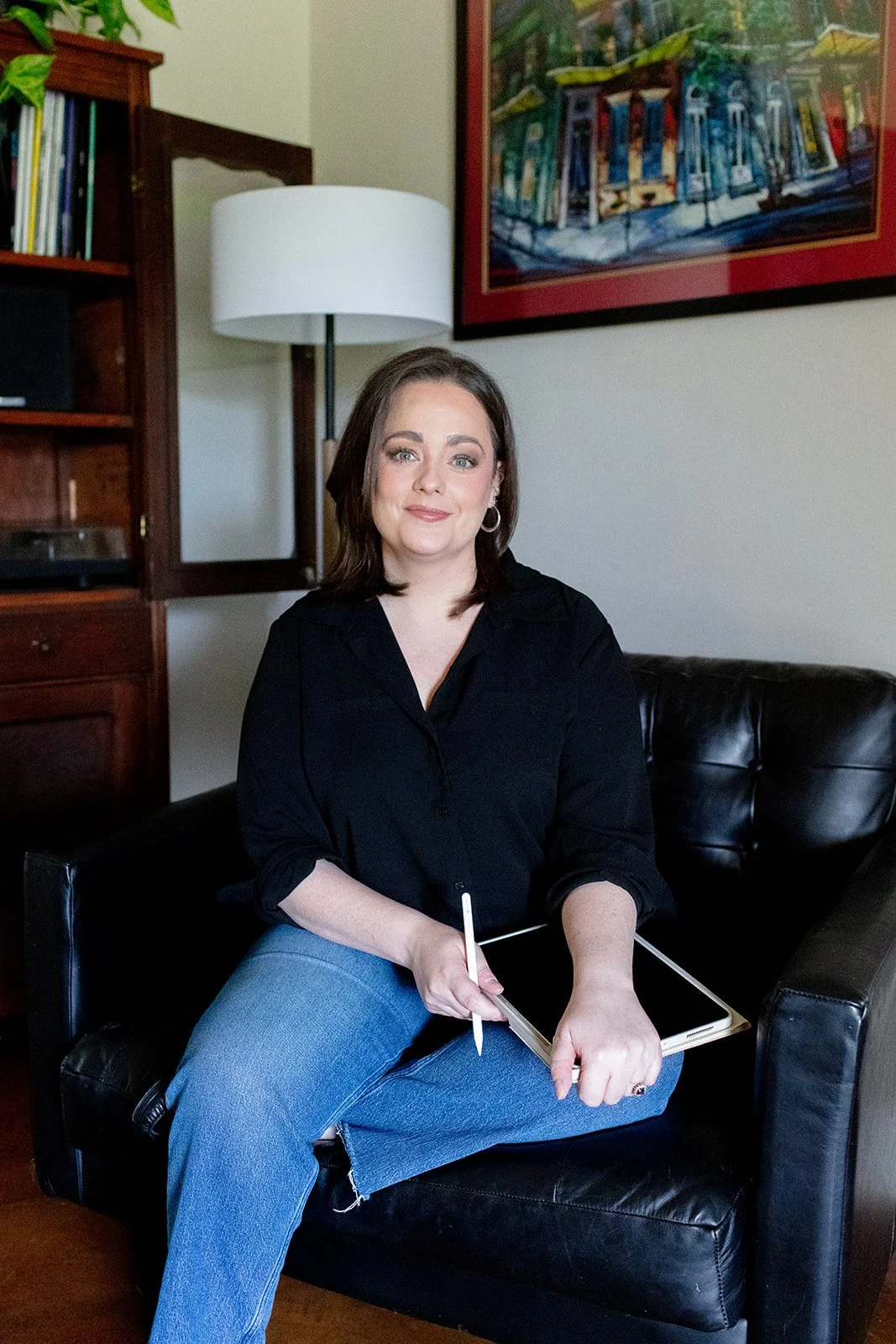 Sheryl Ford, LMFT and LPC, seated in her Louisiana therapy office