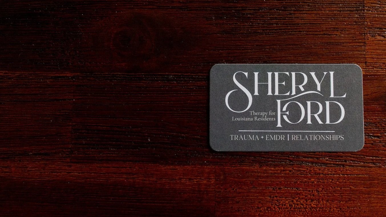 Sheryl Ford business card listing trauma, EMDR, and relationship therapy services
