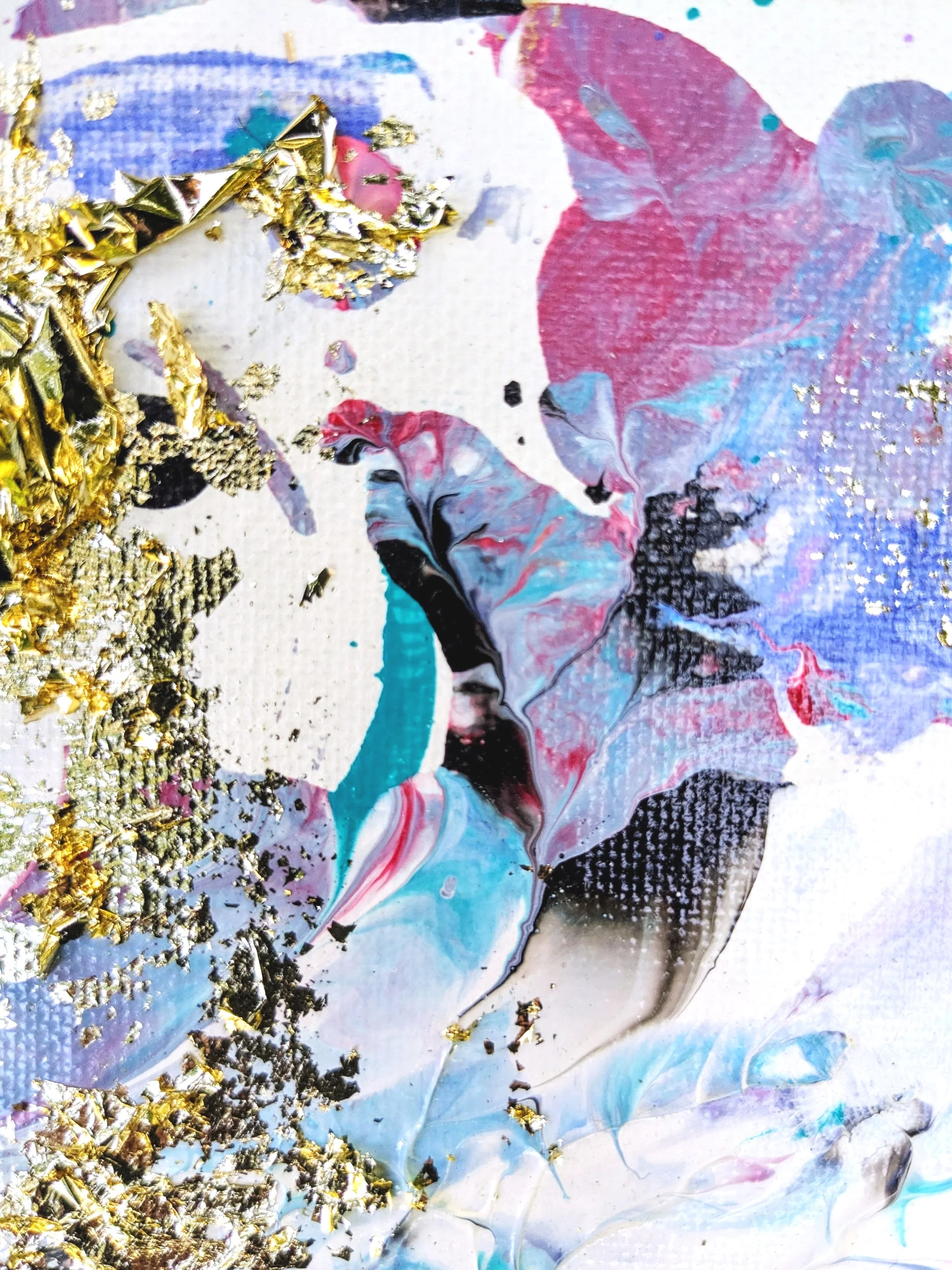 Abstract colorful artwork with swirling patterns in pink, blue, black, and white, accented with gold leaf details.