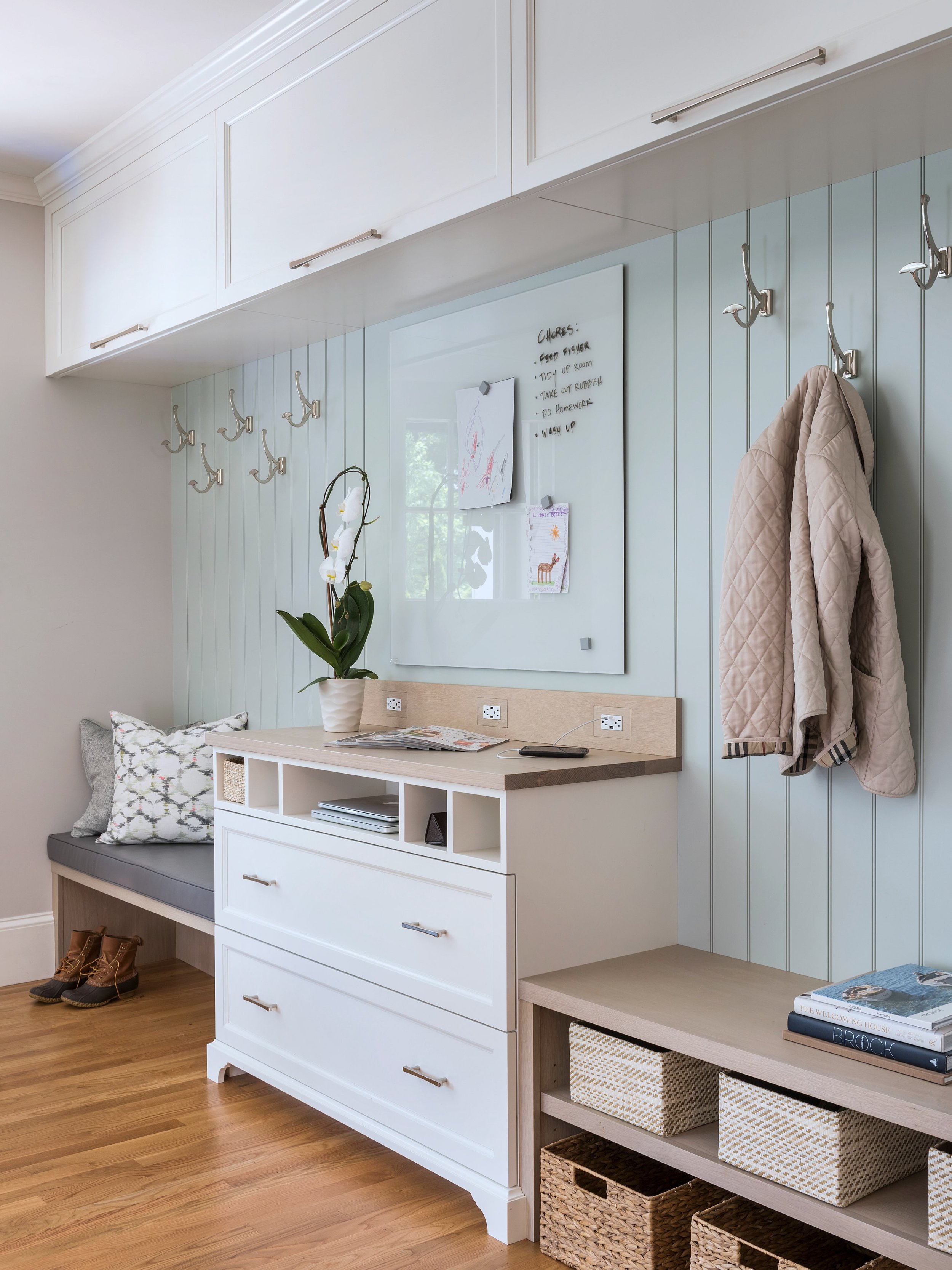 You know you&rsquo;re getting old when you wish for a killer mudroom! Once kids enter the picture, the mudroom becomes every client&rsquo;s fantasy. 

In this East Side house, this mudroom doubles as the mail and key drop so all that clutter stays in