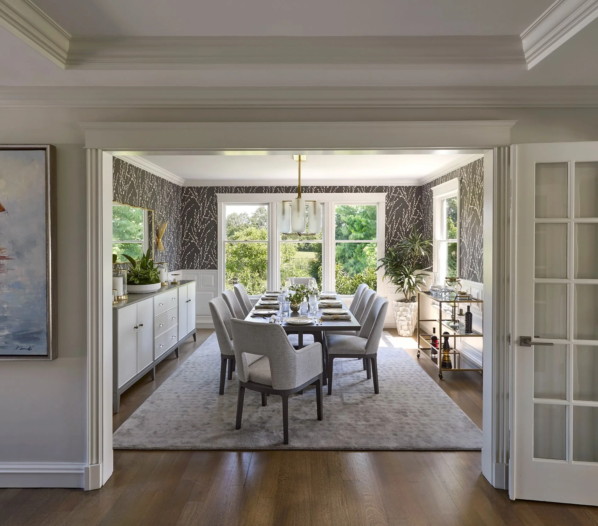 Dining rooms deserve a comeback. 

Who wouldn&rsquo;t want to linger here a while? And if you actually don&rsquo;t like this killer wallpaper (you may be crazy), then focus on the view of the lush landscape and the sea beyond. 

Just be careful&mdash