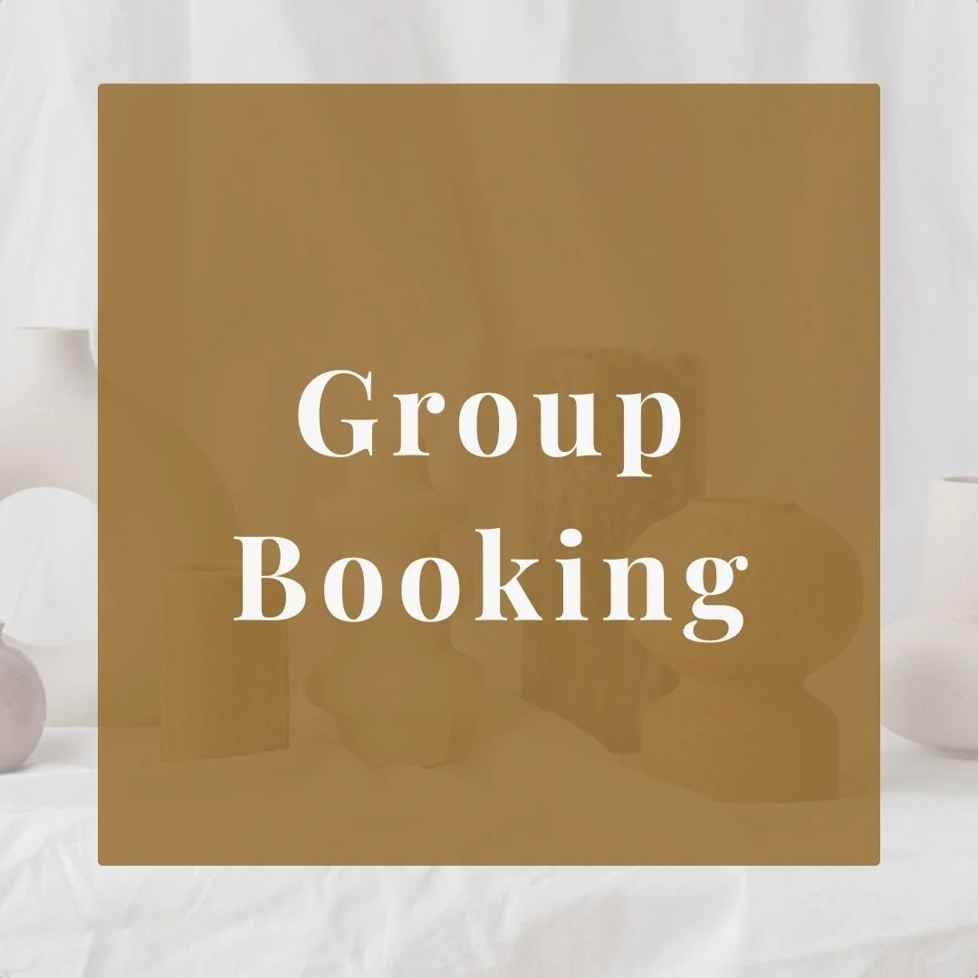 Text overlay reading 'Group Booking' on a background with vases on a table.
