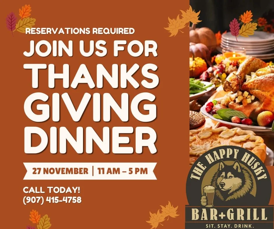 A Thanksgiving dinner event flyer with a background of a thanksgiving meal including turkey, fruits, and vegetables. The event is hosted by The Happy Husky Bar + Grill and features text about reservations, date, time, and contact information.