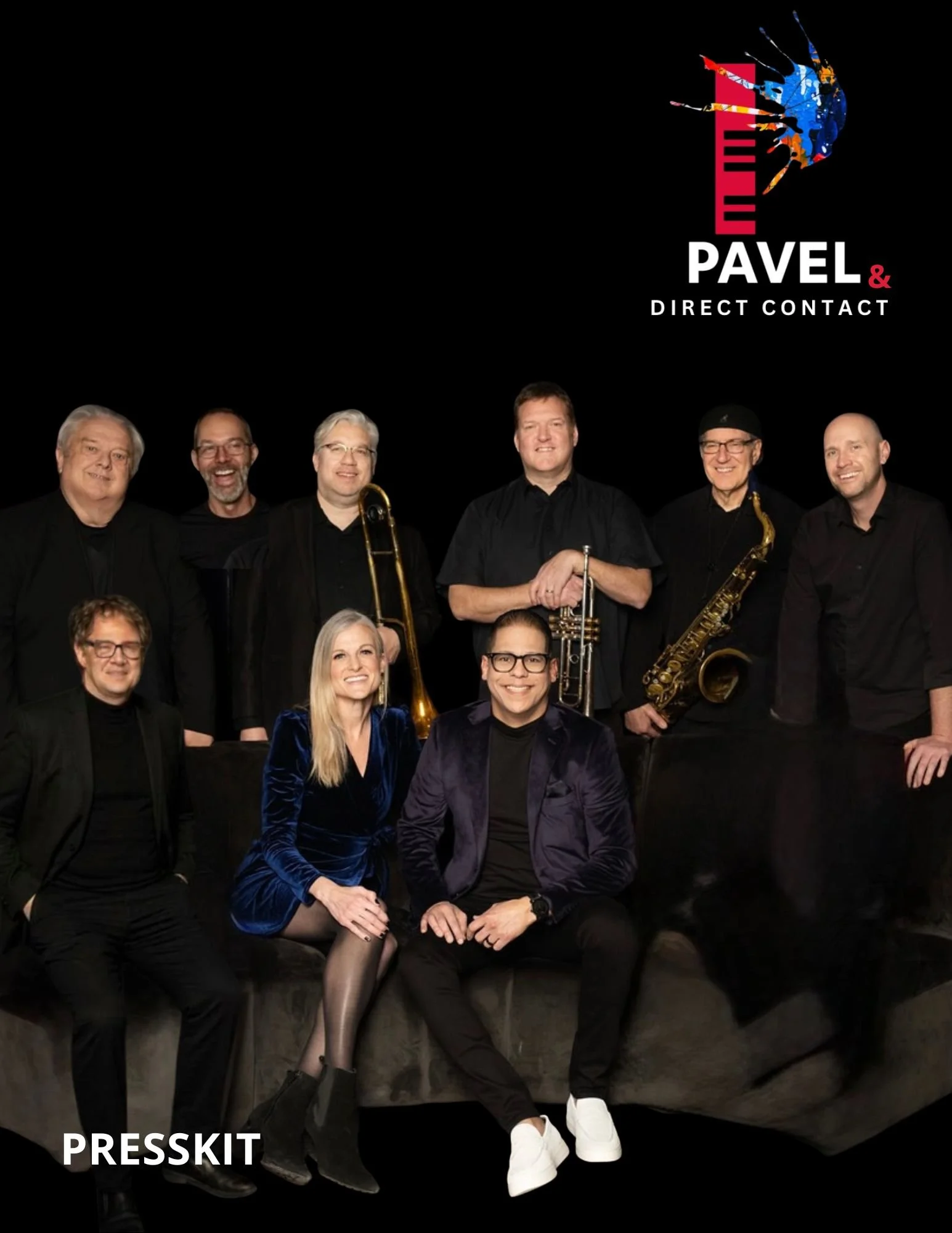 A group of eight people, some holding musical instruments, posing with a black background and a logo that reads "PAVEL & DIRECT CONTACT" in the top right corner. The word "PRESSKIT" appears at the bottom left.
