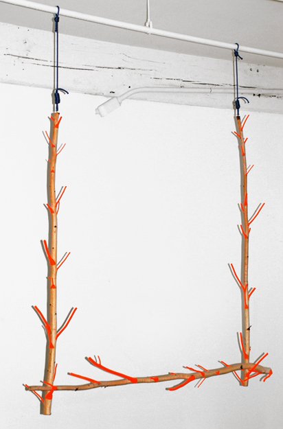  ORANGE SWING    Acrylic paint, birch and cord balanced with no fastenings  84" X 68" X 12"   2007  