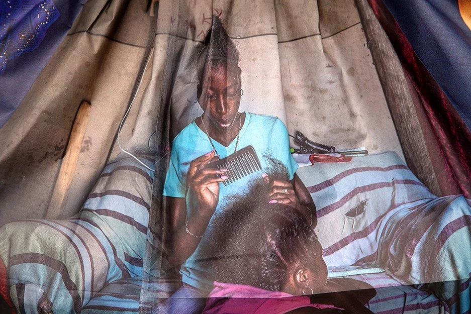  NEW YORK TIMES LITTLE DRESS I  detail   Newsprint and sewing thread  13” x 31”  2018  