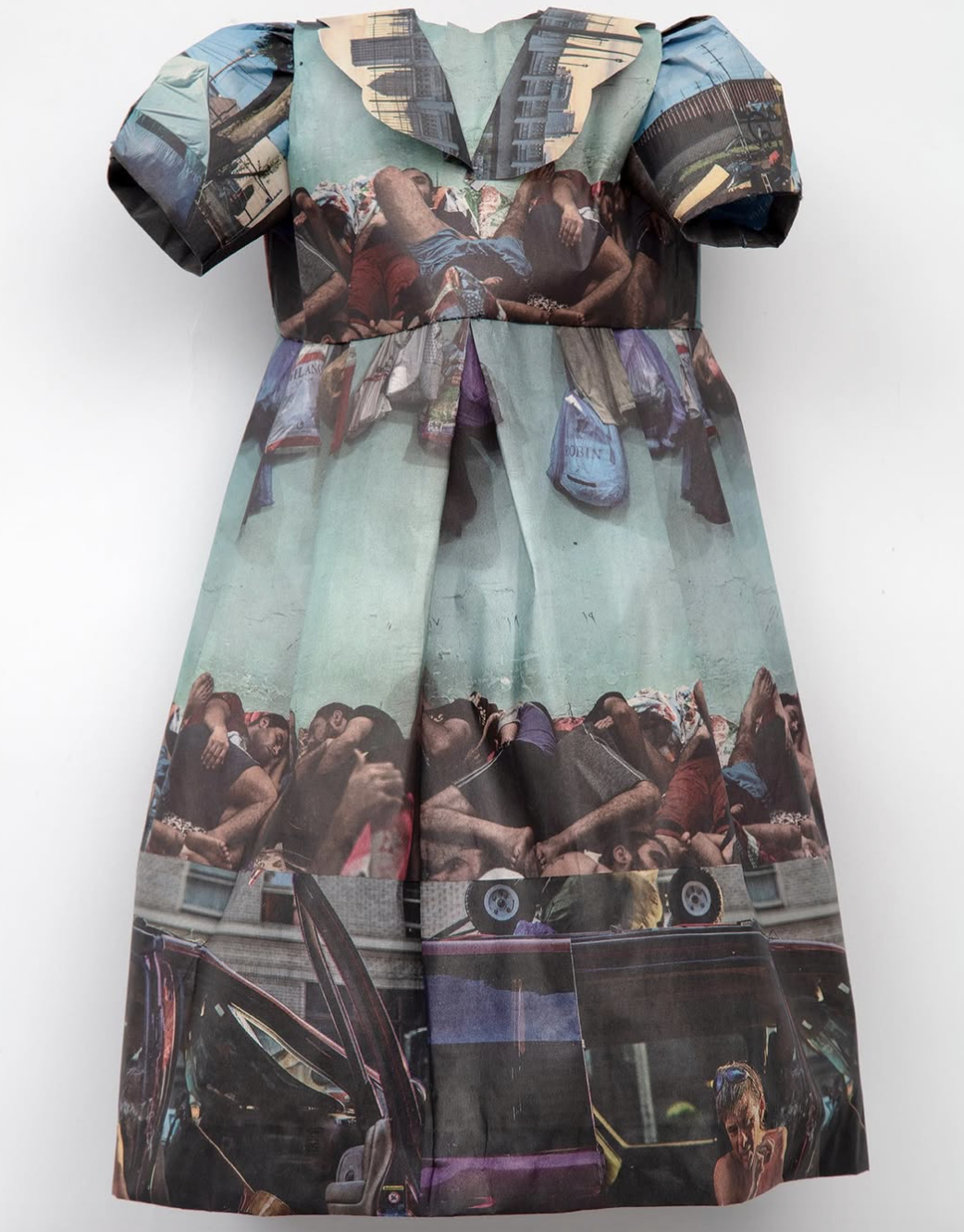  NEW YORK TIMES LITTLE DRESS XII   
 Newspaper and thread 
20” x 13”  
2019  
 