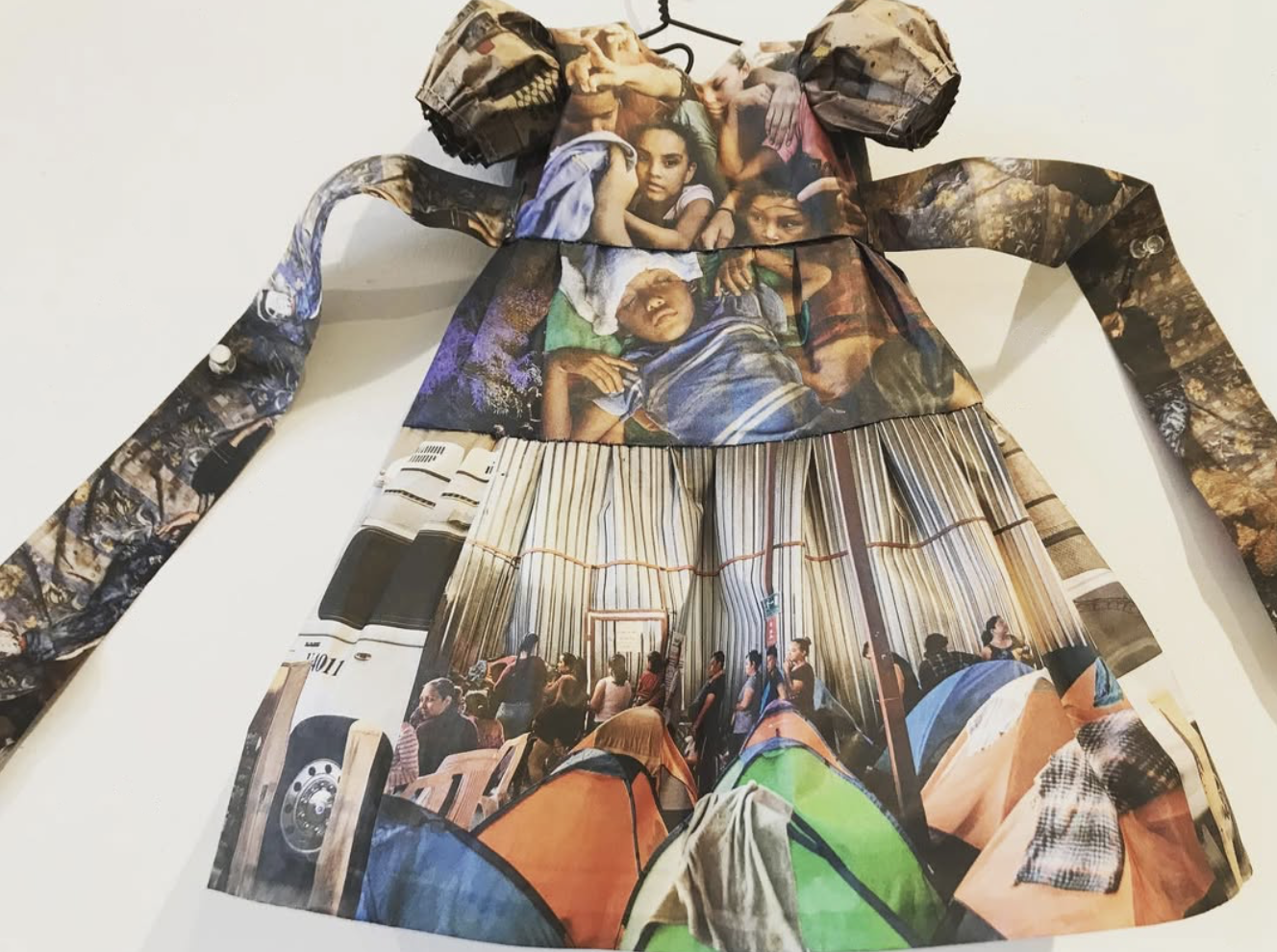  NEW YORK TIMES LITTLE DRESS XI  
 Newsprint and thread 
14” x 14” 
2019  
 