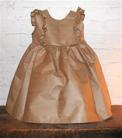  LITTLE BROWN DRESS    Brown construction paper and thread  24” X 24”  2004  