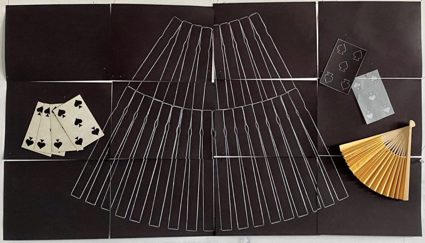  SAME SAME BUT DIFFERENT VIII  
 Playing cards, fan, white colored pencil on paper 
27” x 48”  
2022 
 
