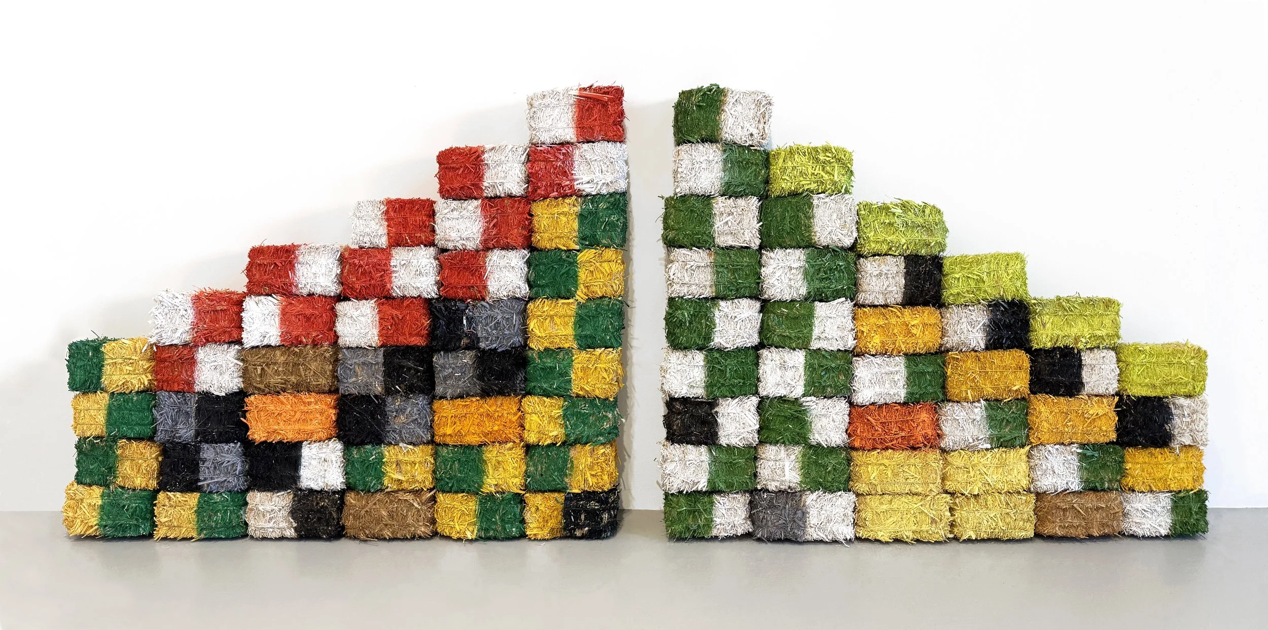  SPLIT STRAW PYRAMID  
 Spray acrylic on small straw bales 
25” X 68” X 2”  
2024 
 