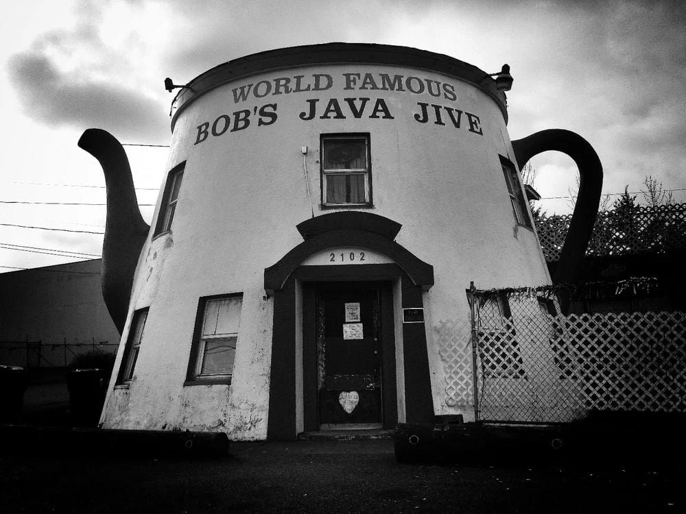 A building shaped like a teapot with the sign 'World Famous Bob's Java Jive' on the front.