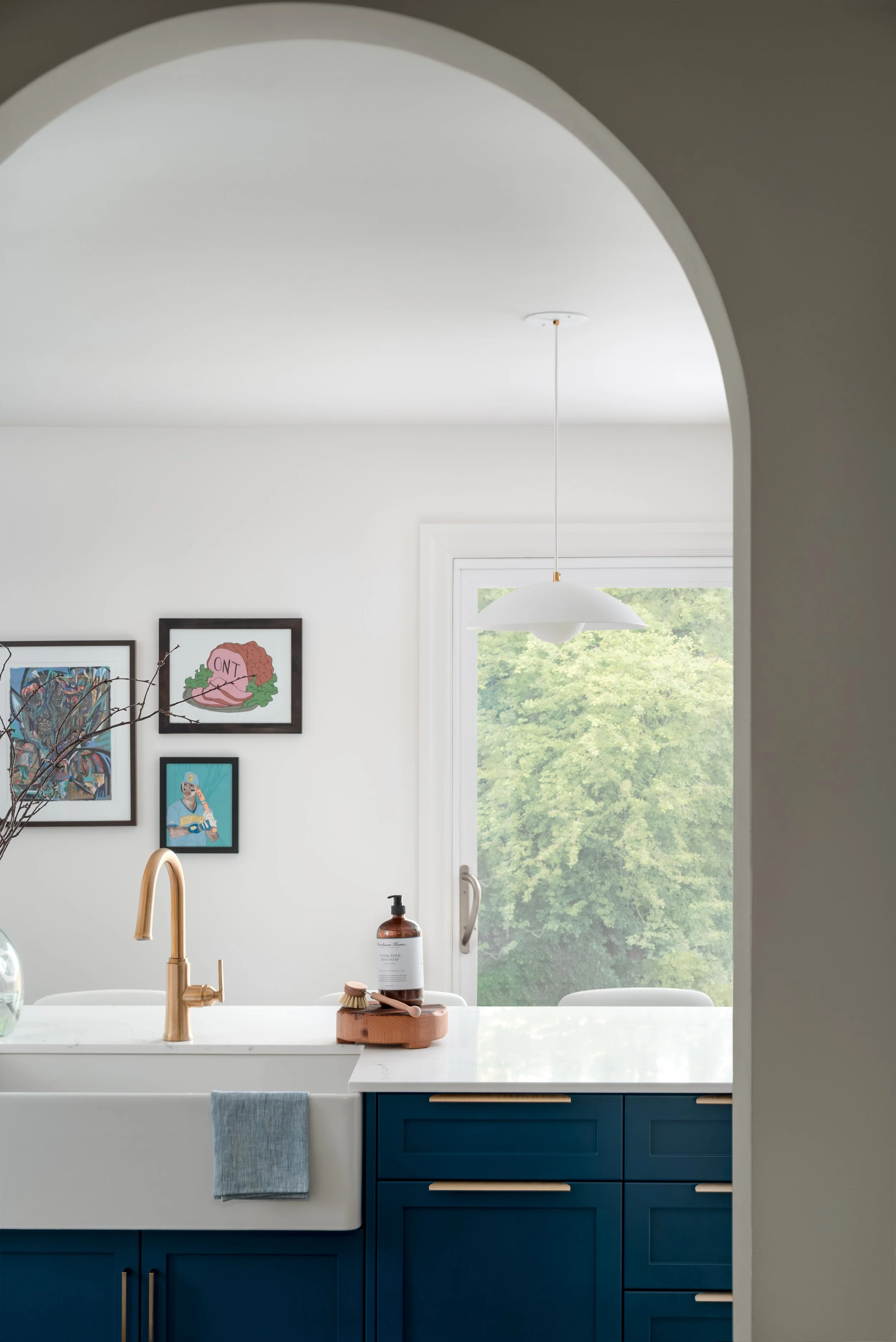 Archway Kitchen Design Navy Island Farmhouse sink brass faucet.jpg