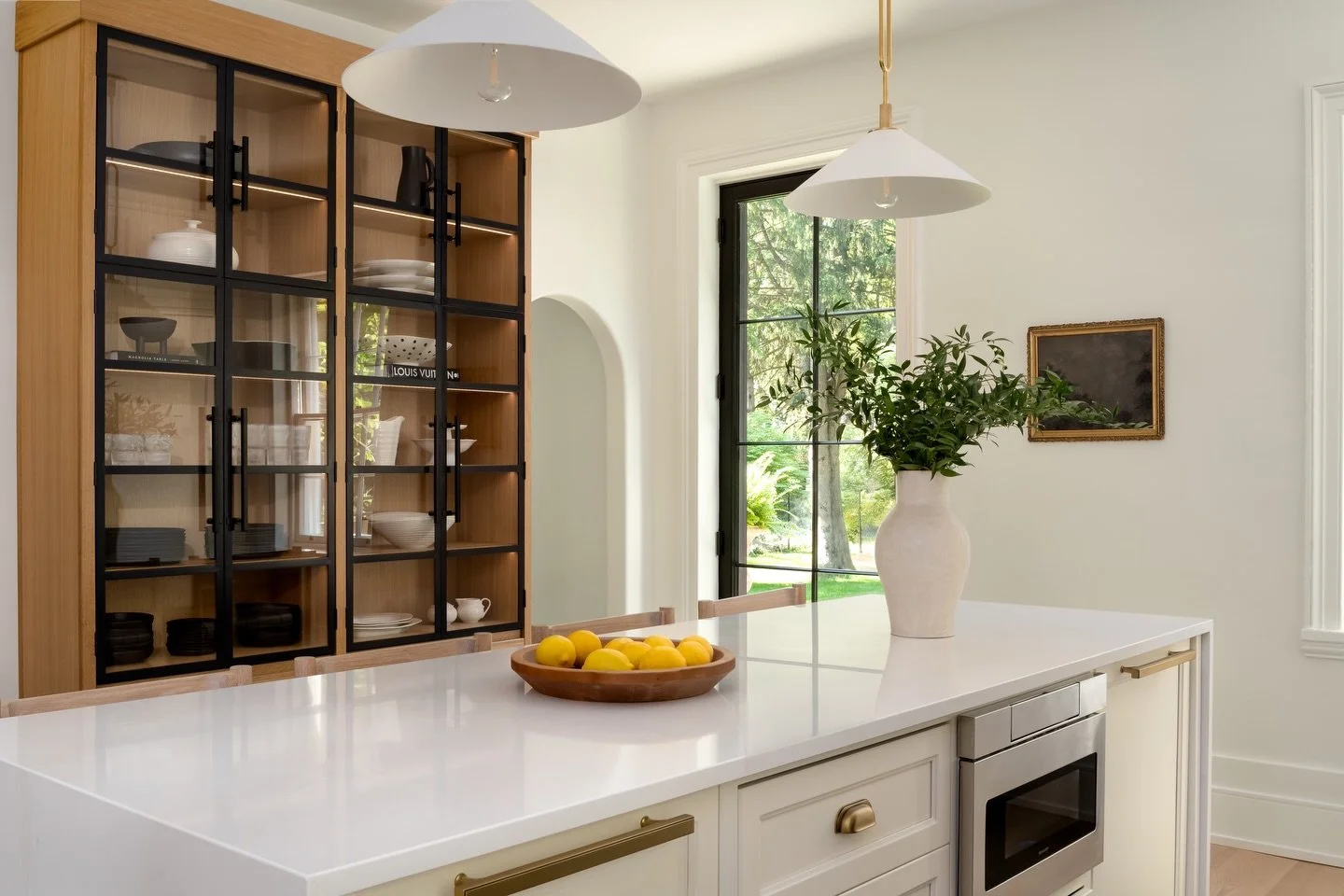 The best of both worlds. 🖤 

For The Heritage Edit, we designed this custom hutch to be as functional as it is beautiful. We used glass doors on the top to create a curated display for favorite serving dishes while the bottom drawers work hard behin