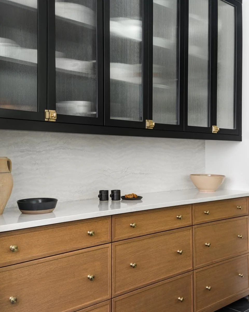 This breakfast bar was designed with busy mornings in mind! 

A busy home with young kiddos who are just on the edge of independence called for a space that was practical without feeling utilitarian. 

Bowls, cutlery, and cereals are kept in the lowe