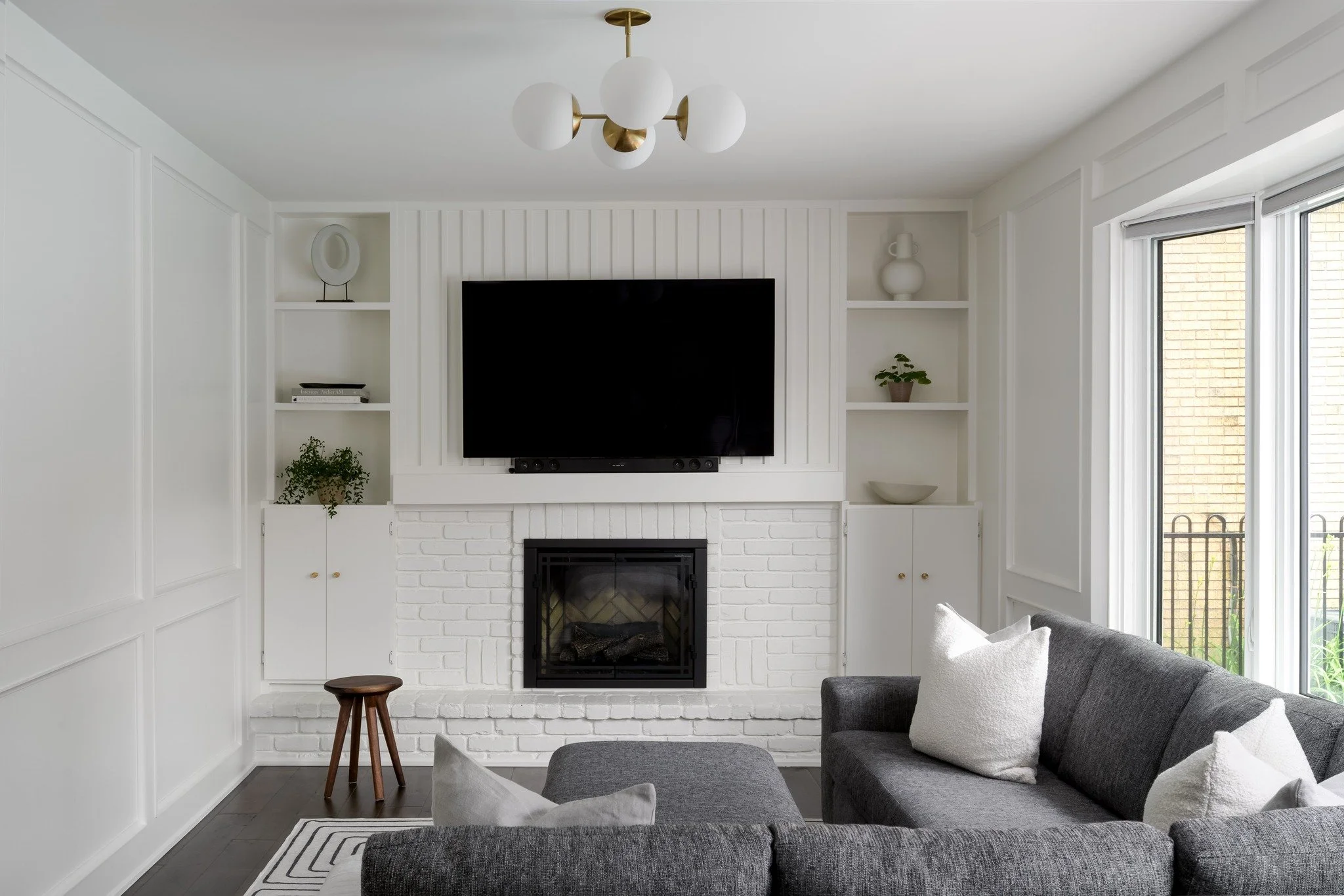 Project "The Modern Hue" is the perfect example of how subtle changes make the absolute biggest statement.

We let the architectural details do the heavy lifting here. Instead of tearing it all out, we kept the existing wall paneling and br