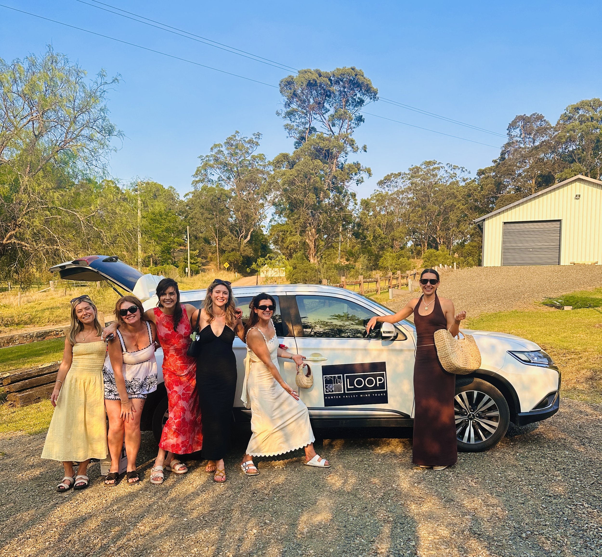 Group of six women in loop tours hunter valley wine tours.